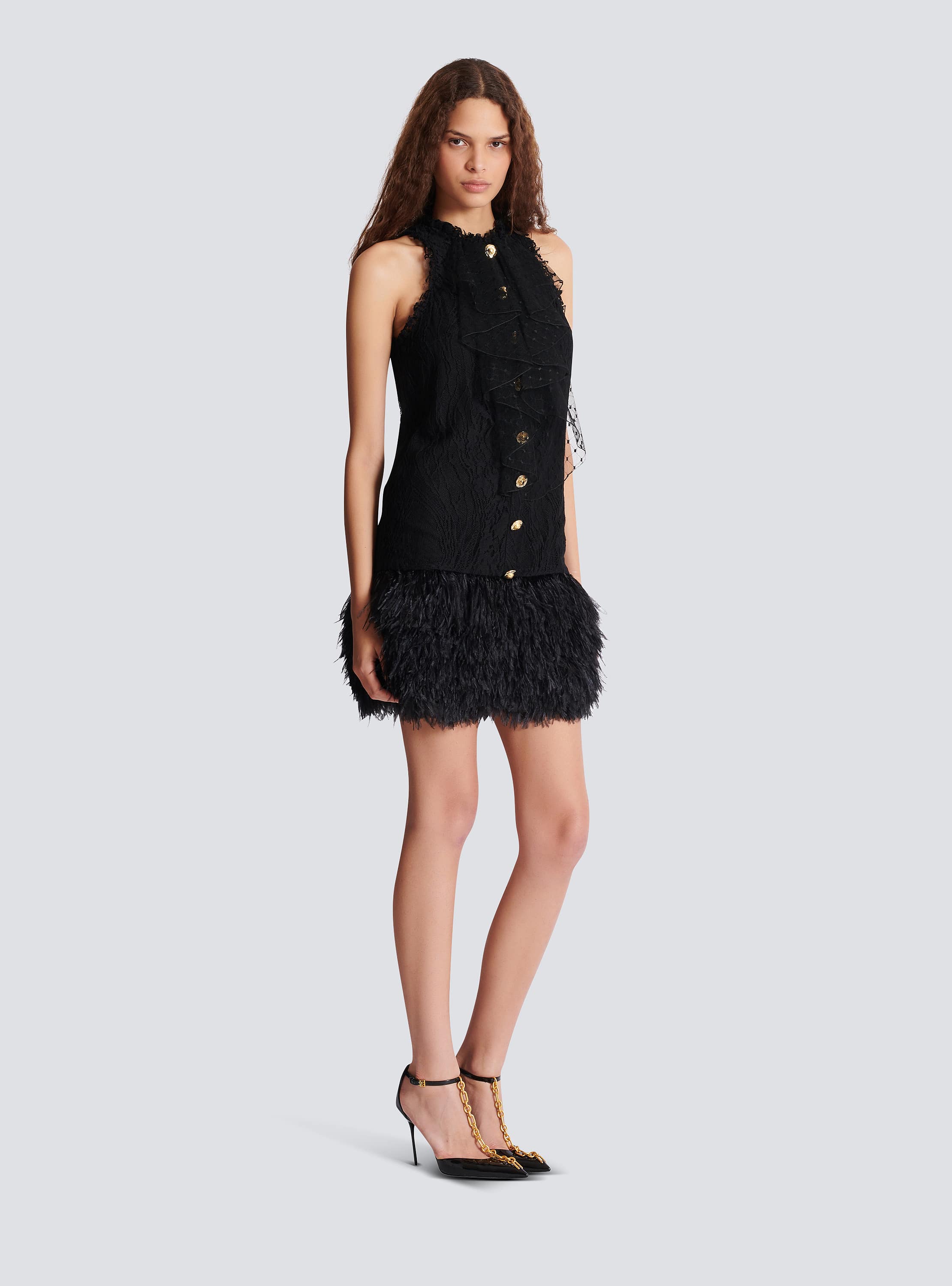 Flowing lace and feather dress