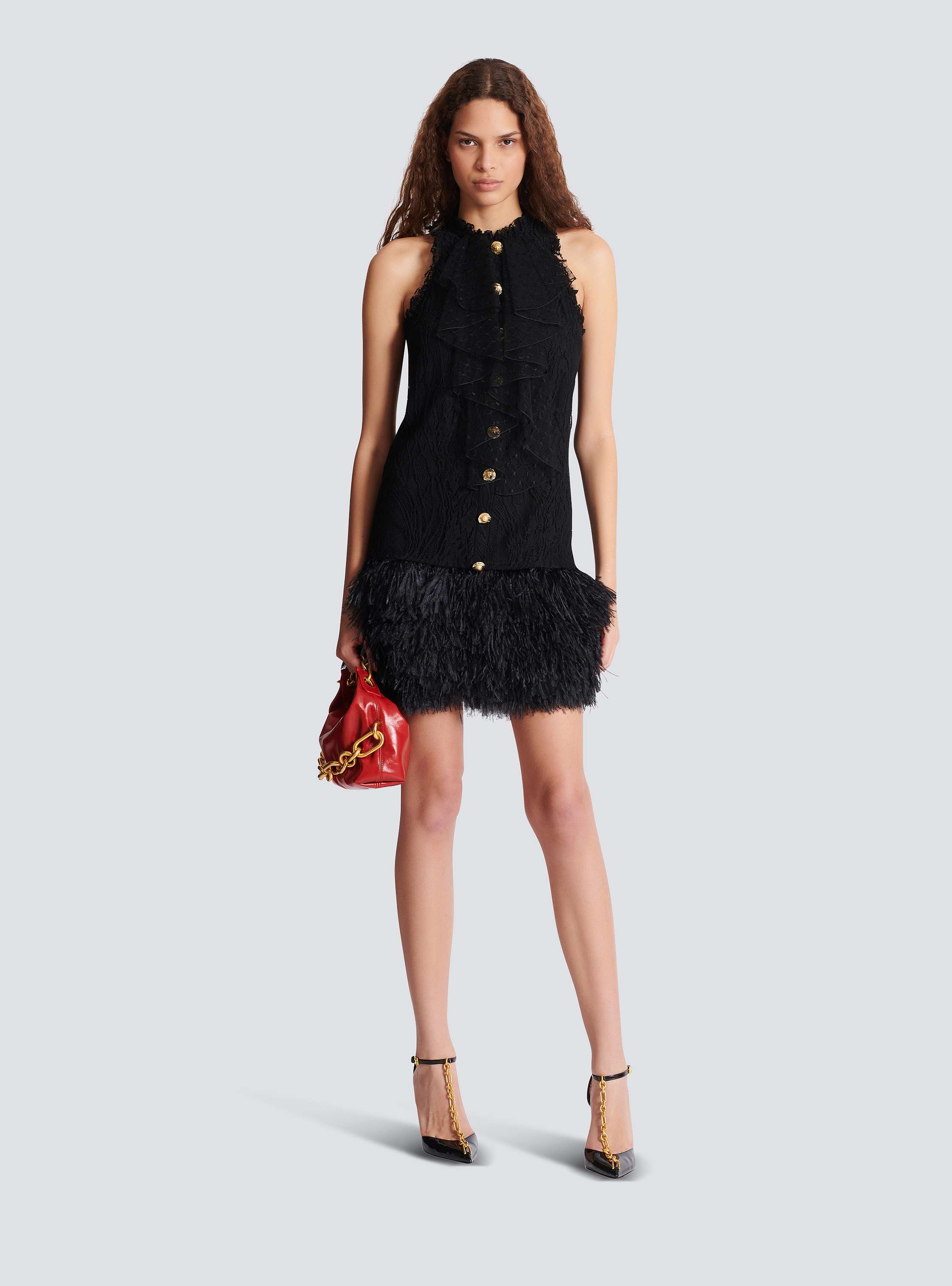 Flowing lace and feather dress