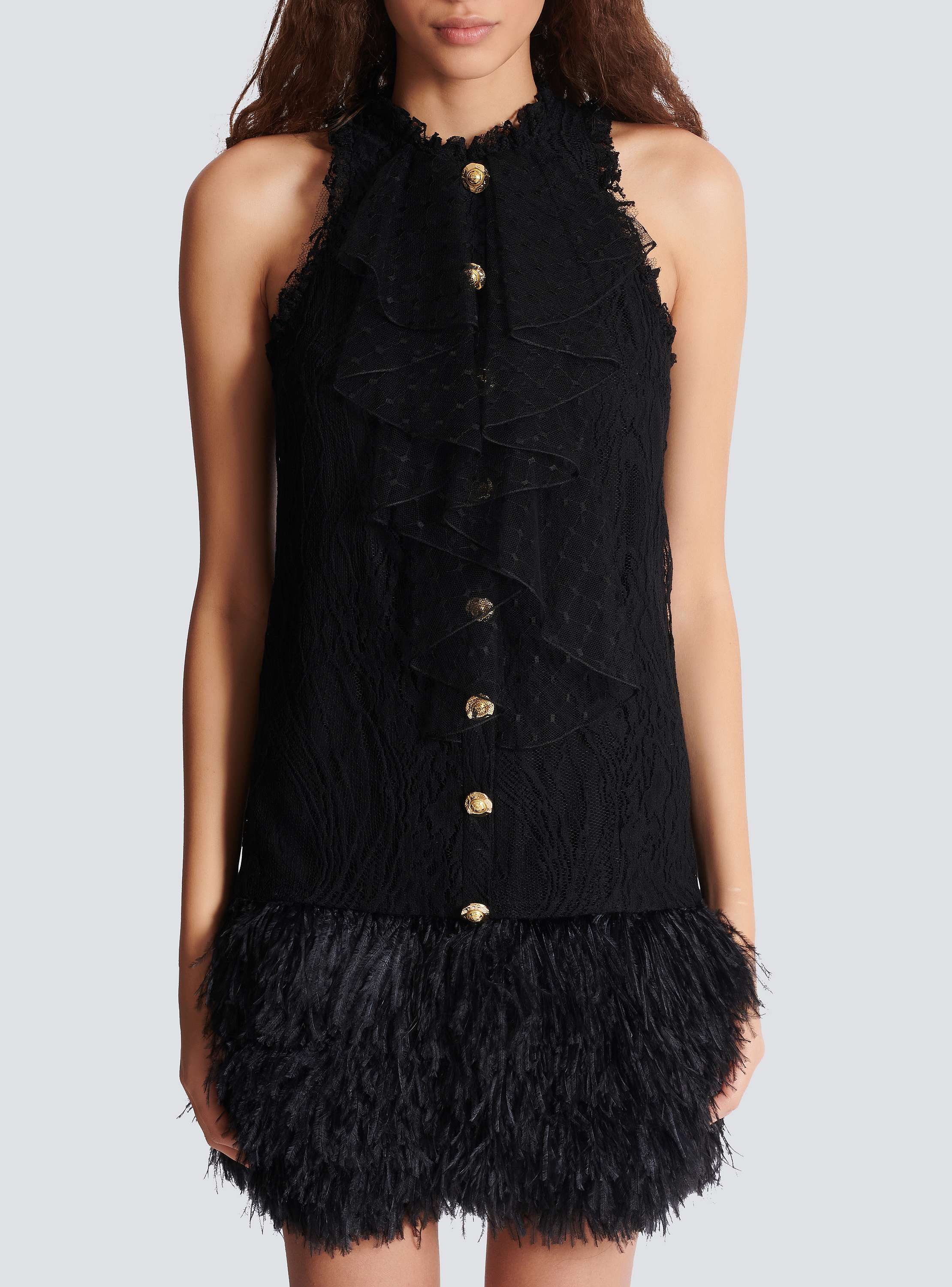 Flowing lace and feather dress