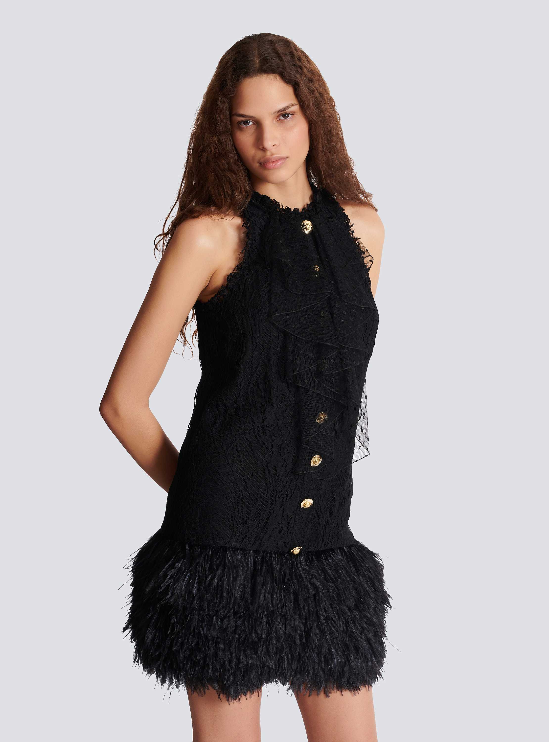 Flowing lace and feather dress