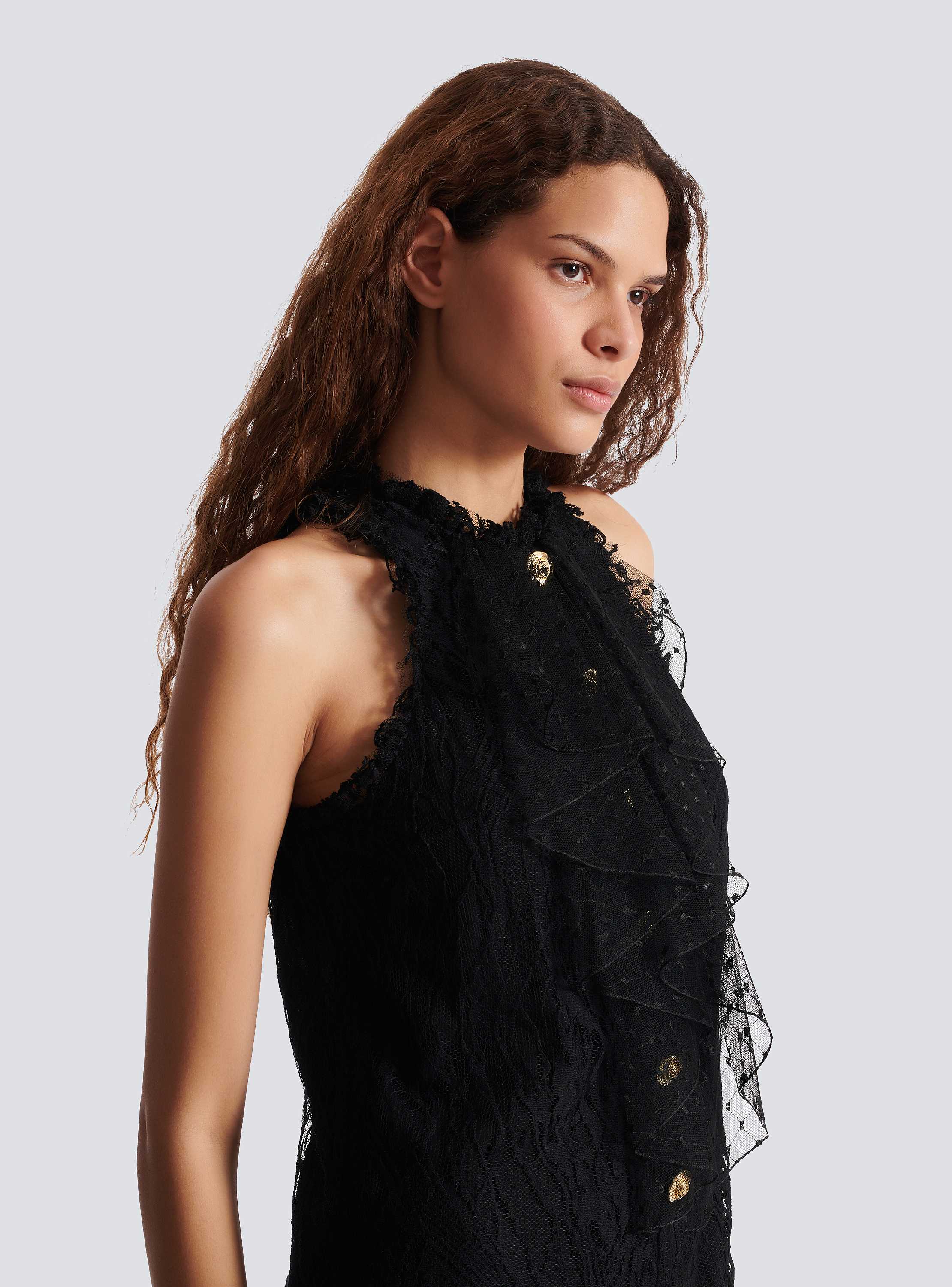 Flowing lace and feather dress