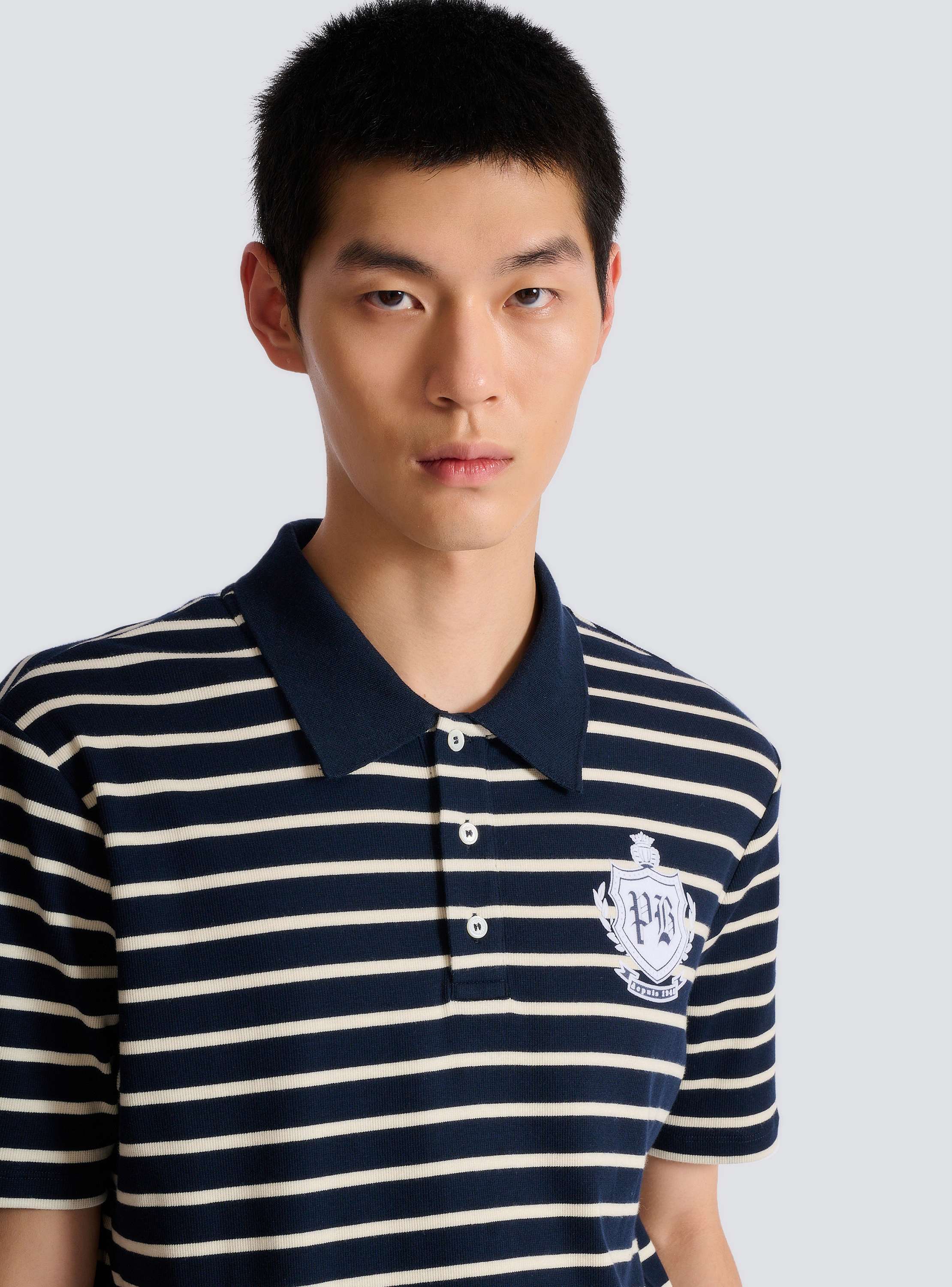 Striped College Emblem polo