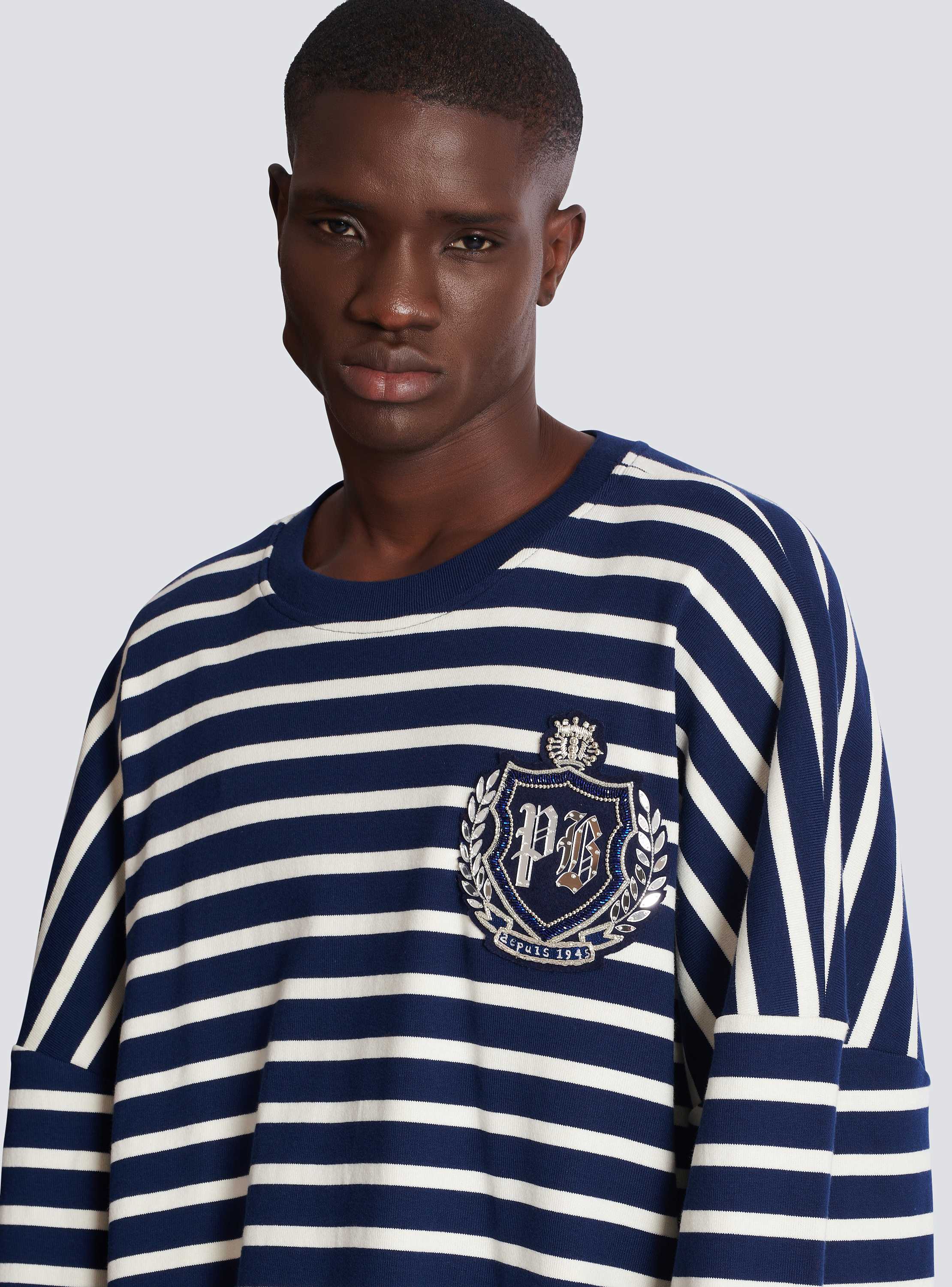 Cotton College Emblem sweatshirt with Breton stripes