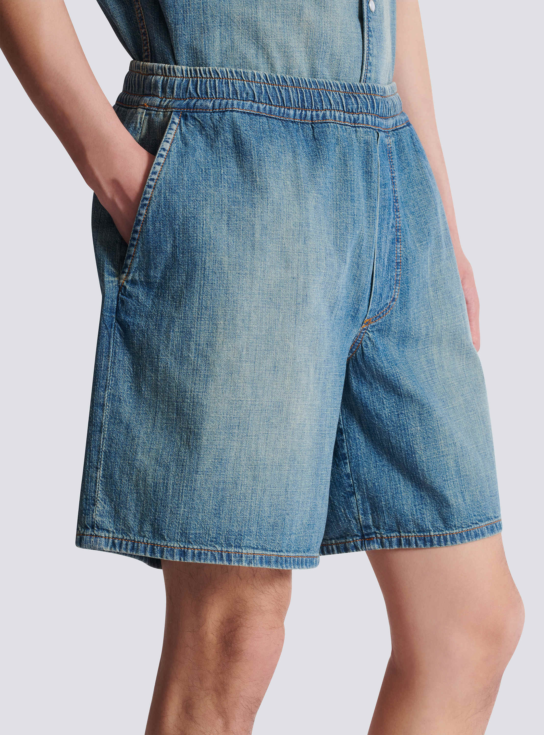 Faded denim shorts