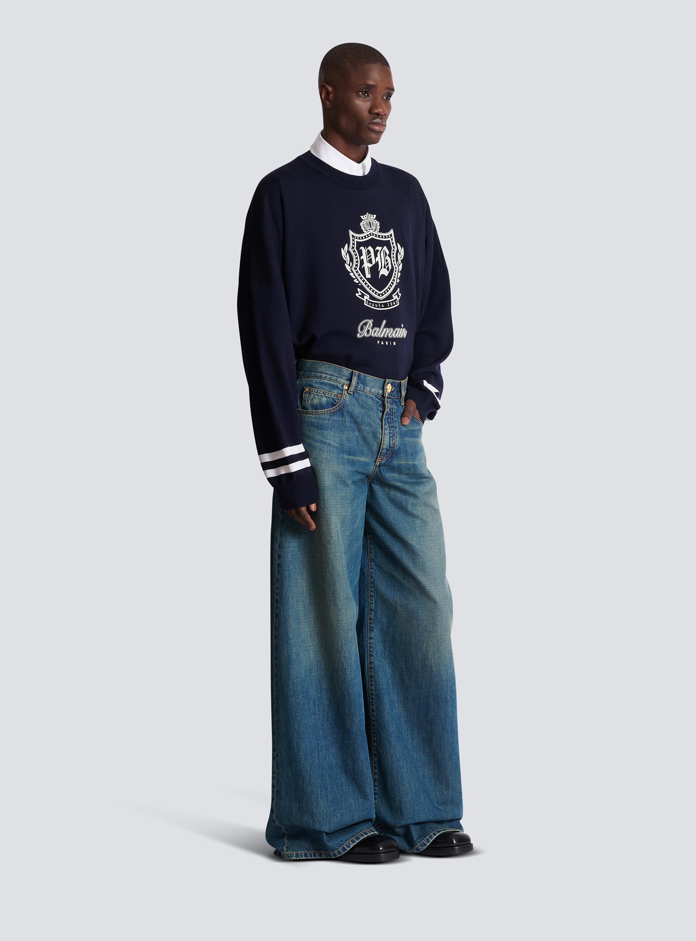 Wide-leg faded denim jeans