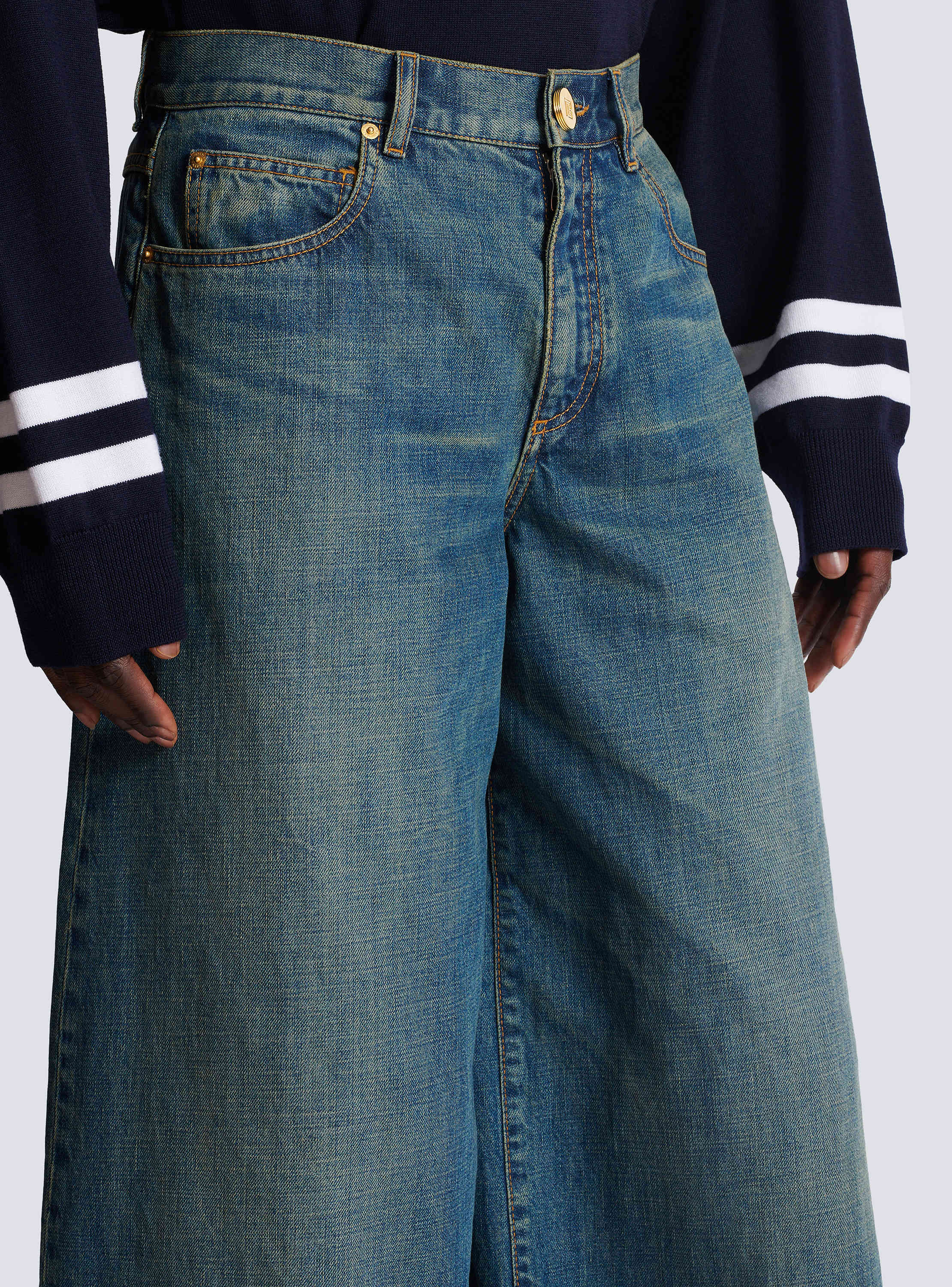 Wide-leg faded denim jeans
