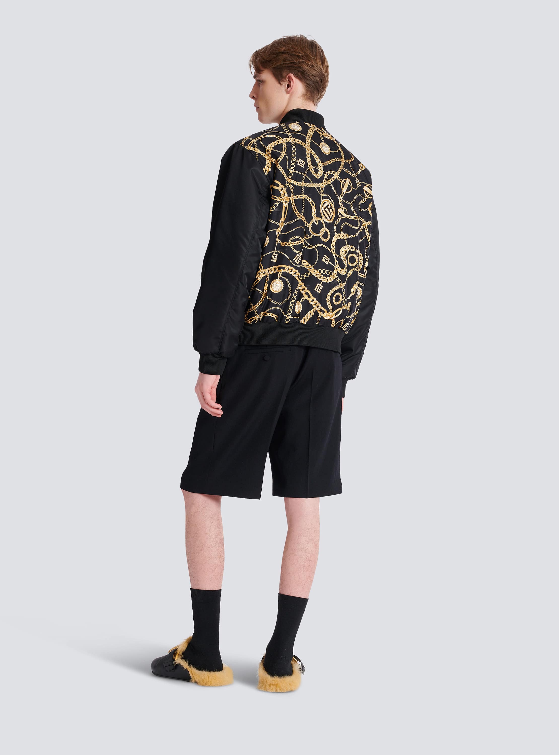Reversible printed bomber jacket with Chaînes pattern 