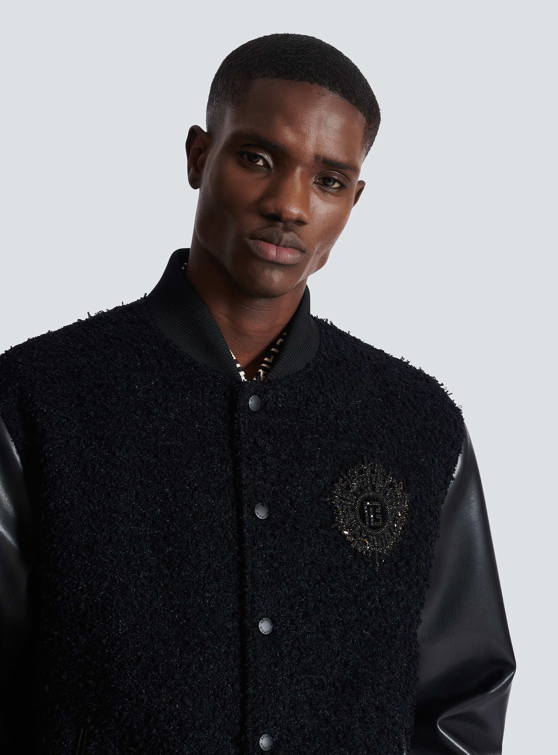 Varsity tweed and faux leather jacket