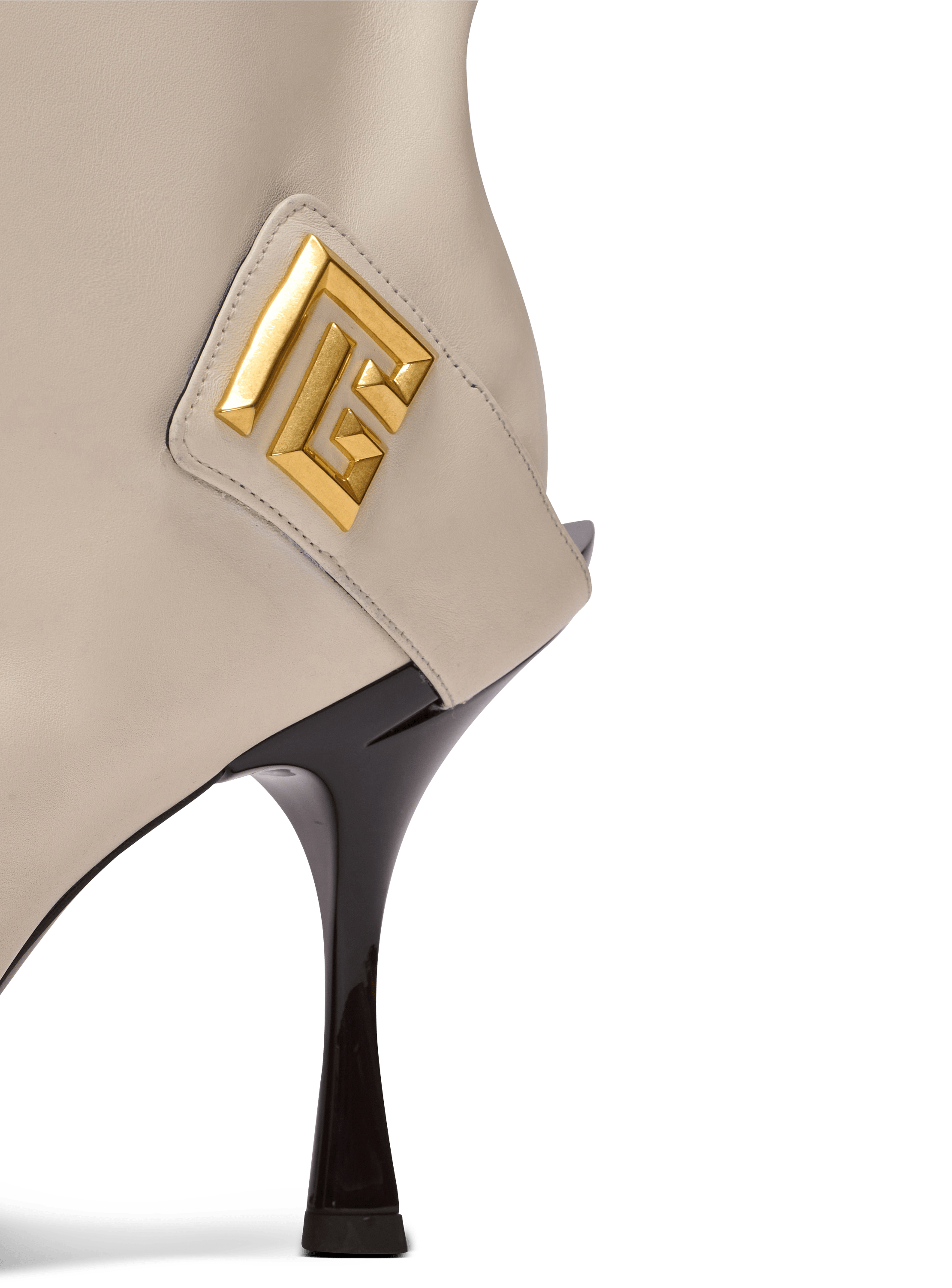 Twist heeled leather boots