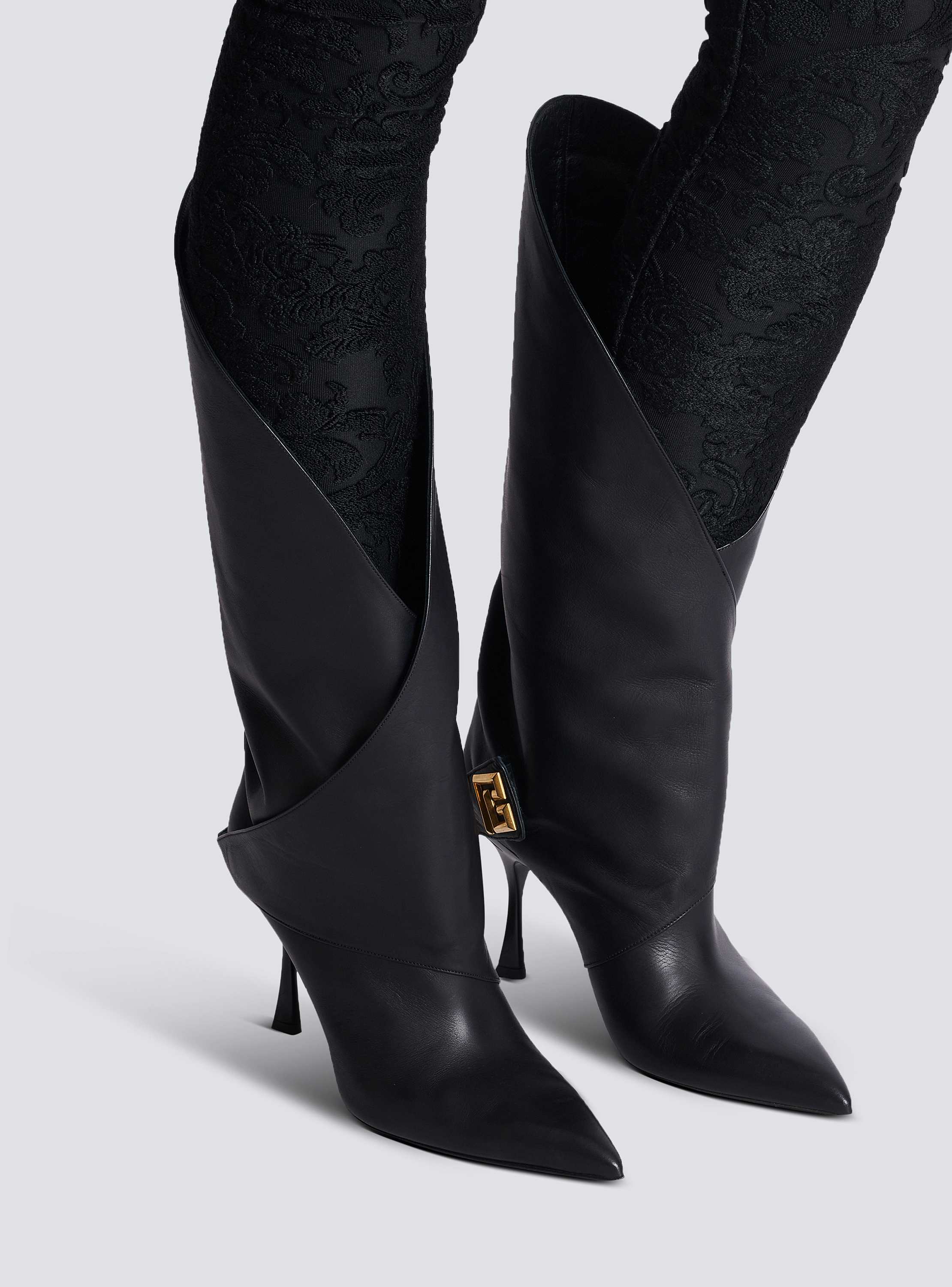 Twist heeled leather boots