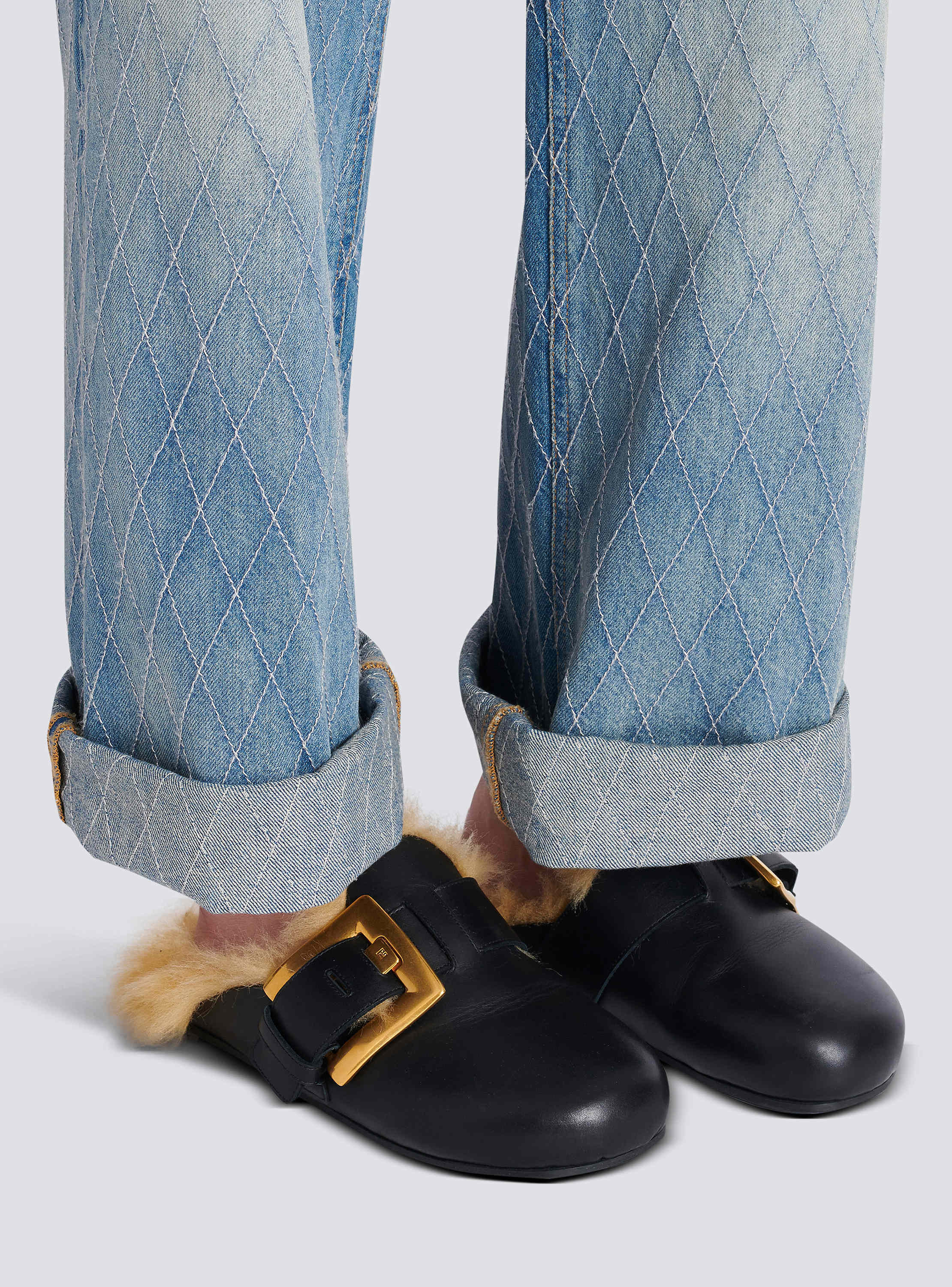 Flat leather and faux fur mules