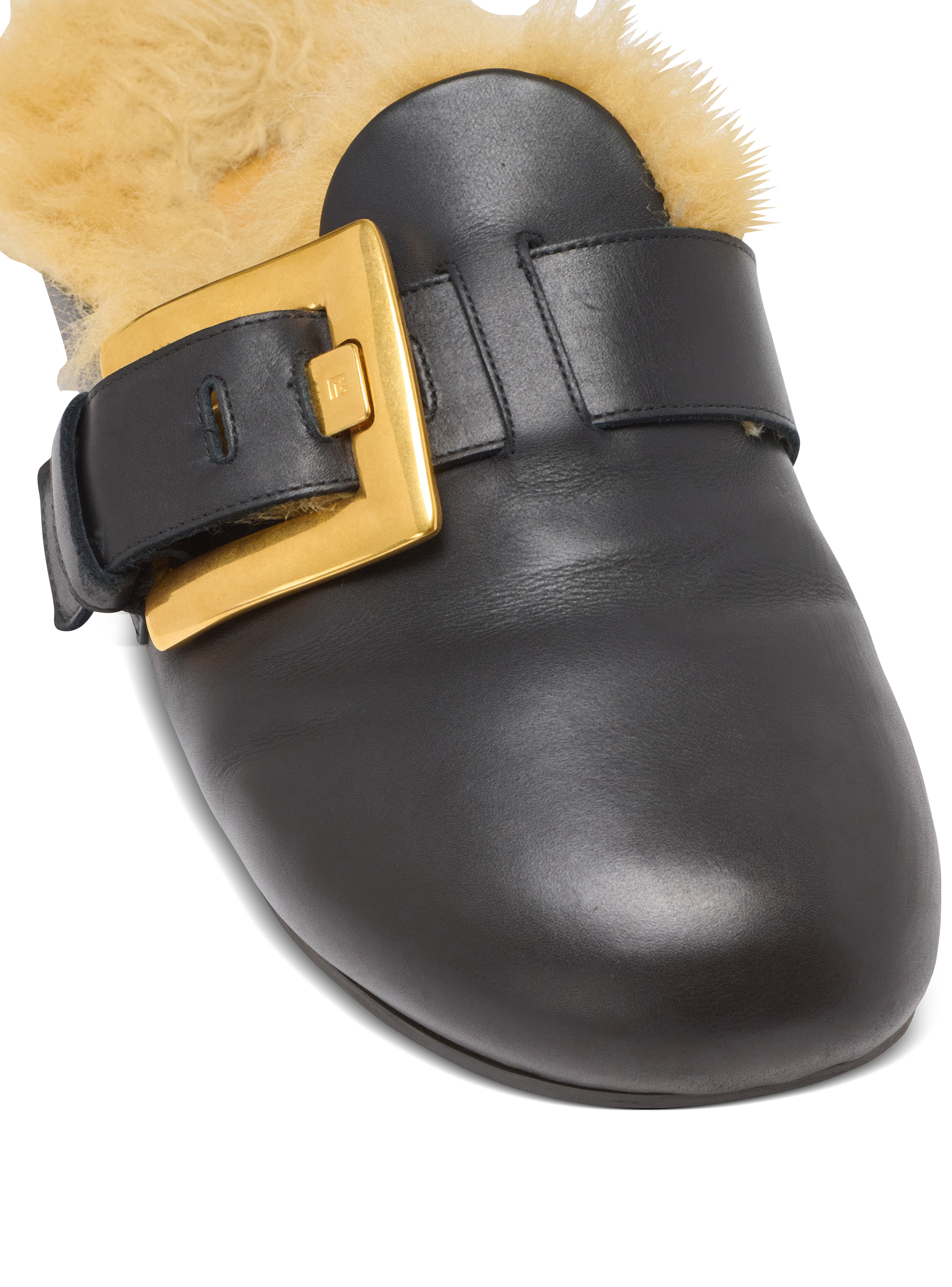 Flat leather and faux fur mules