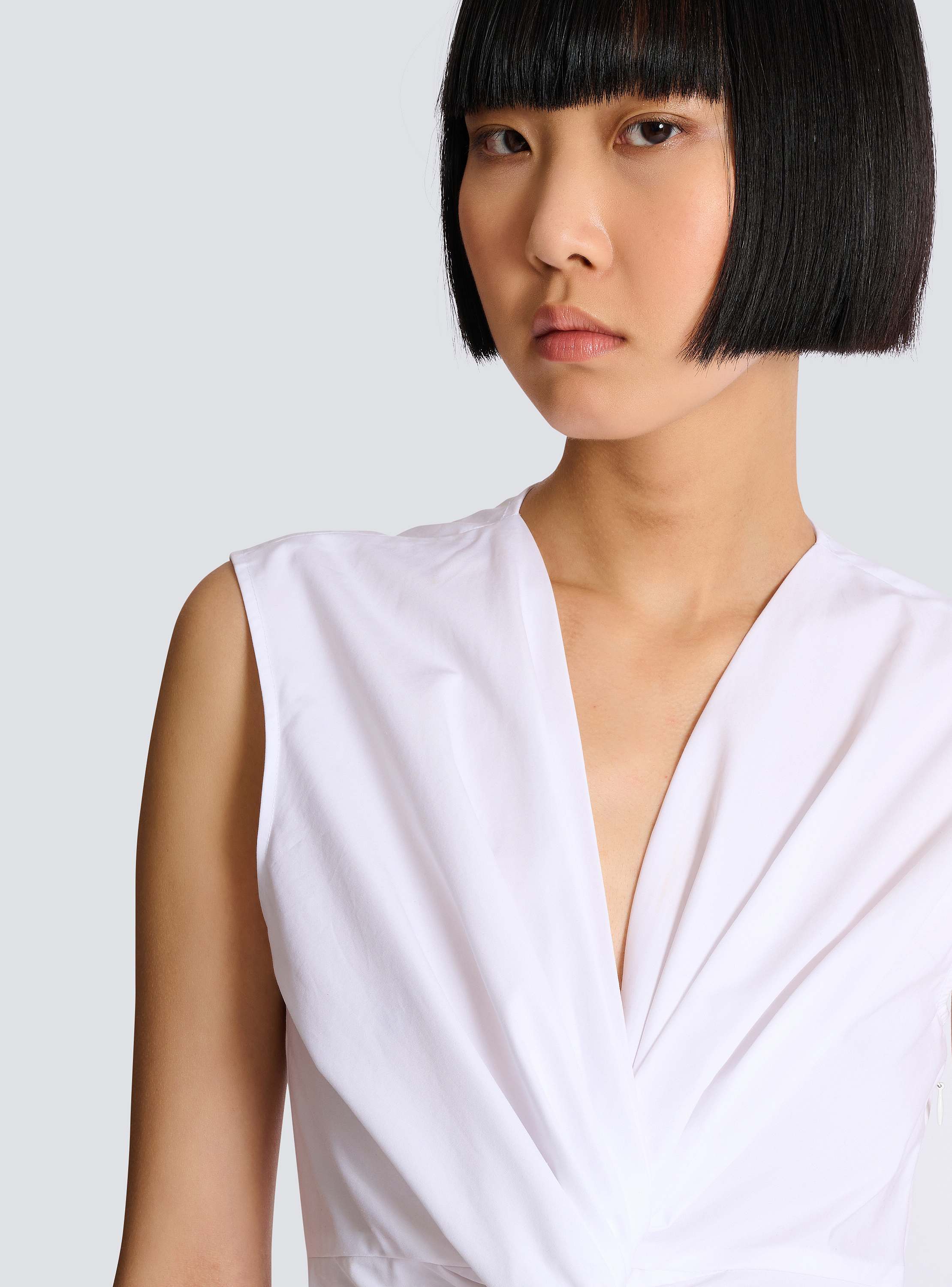 Draped sleeveless cotton poplin shirt