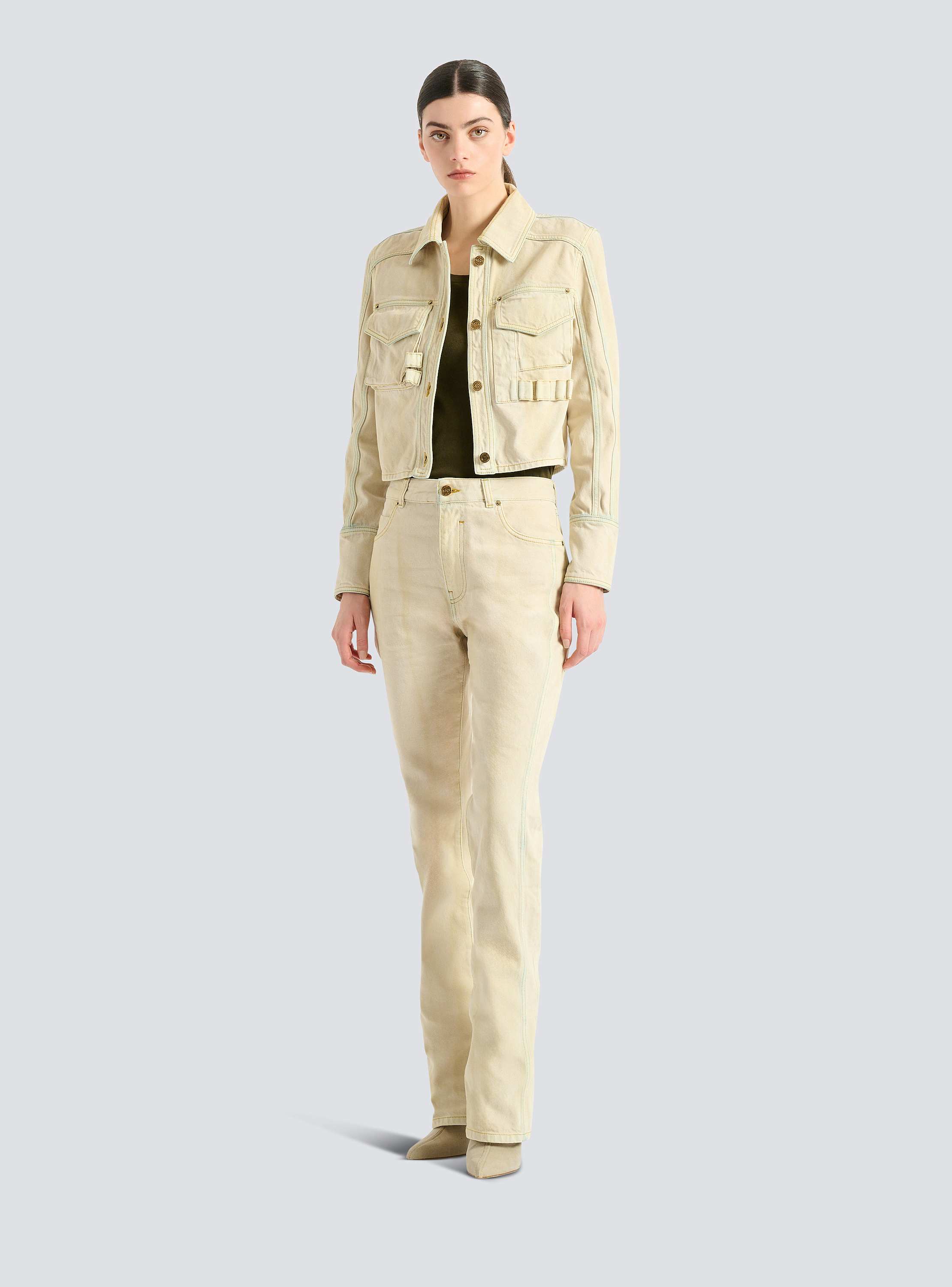 High-waisted faded denim jeans