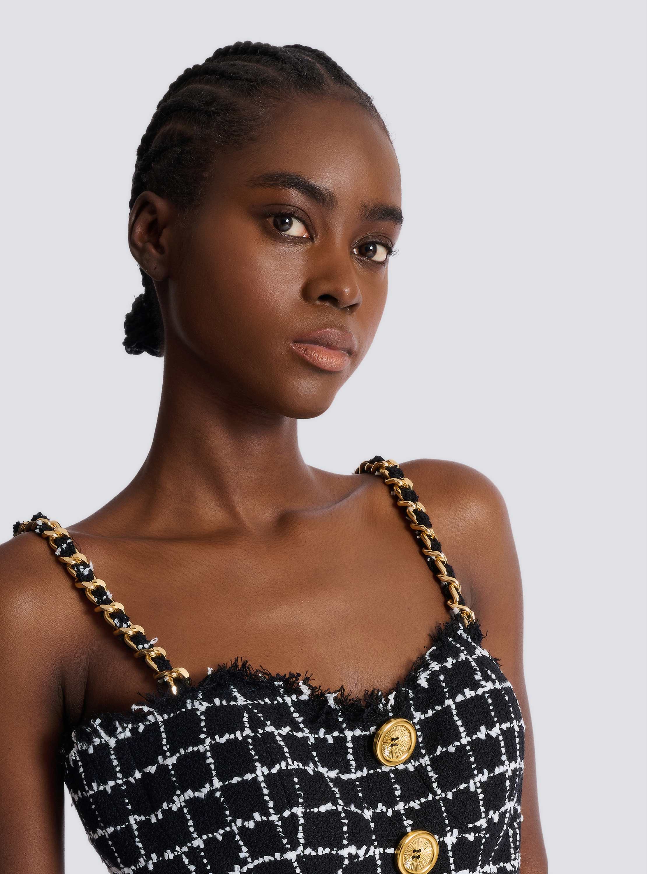 Tweed top with chain straps and buttons