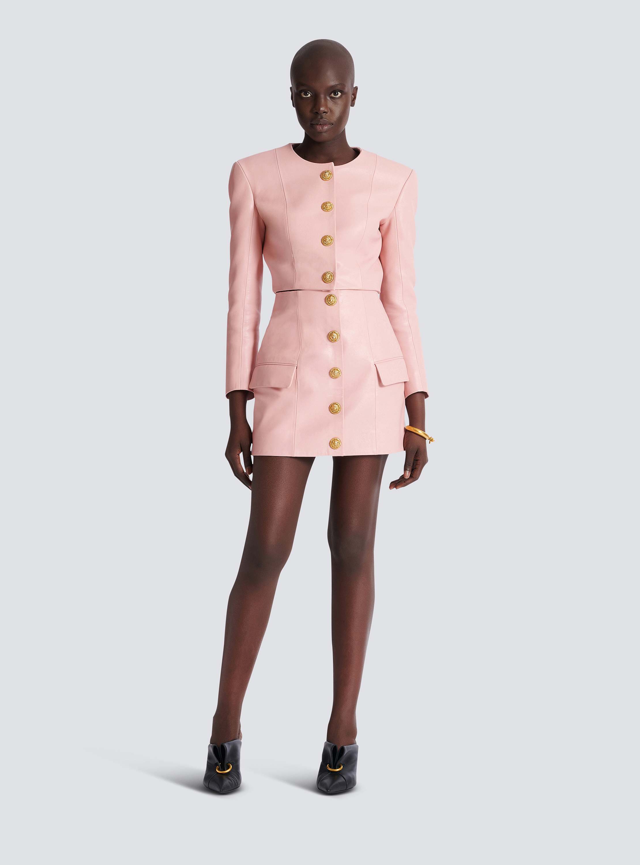 Short lambskin skirt with buttons