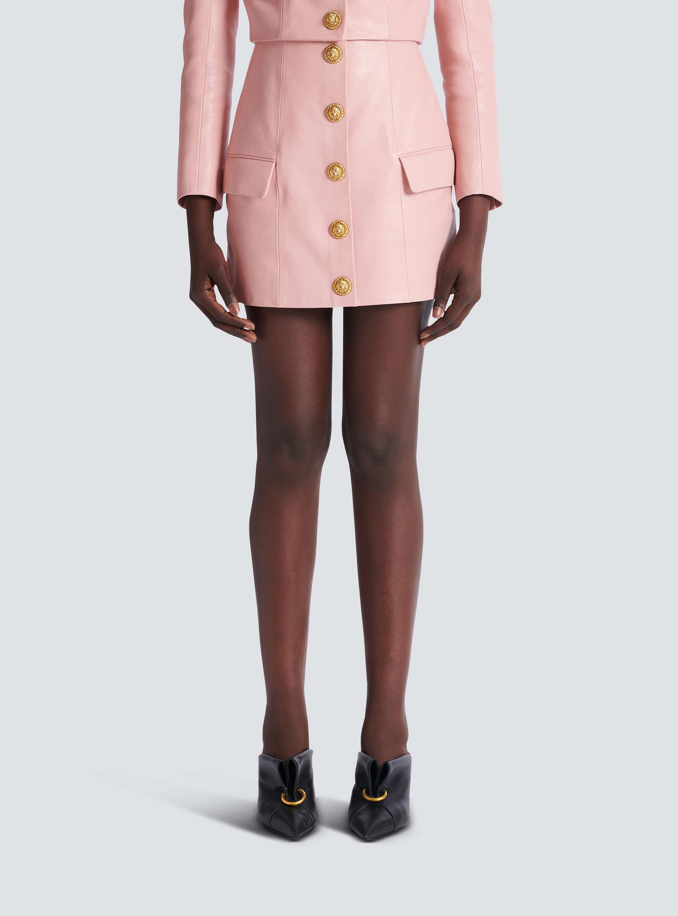 Short lambskin skirt with buttons