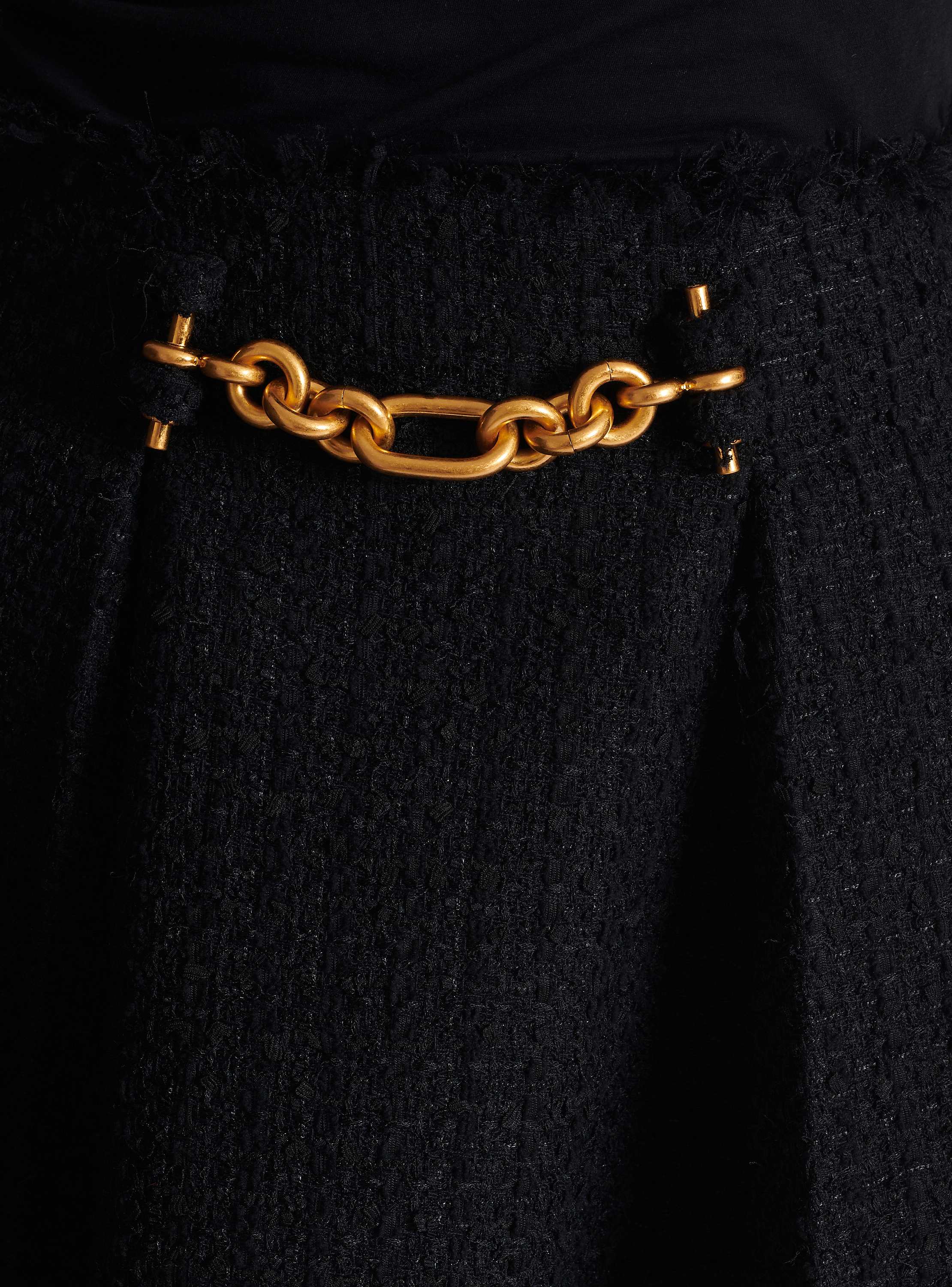 Pleated flared tweed skirt