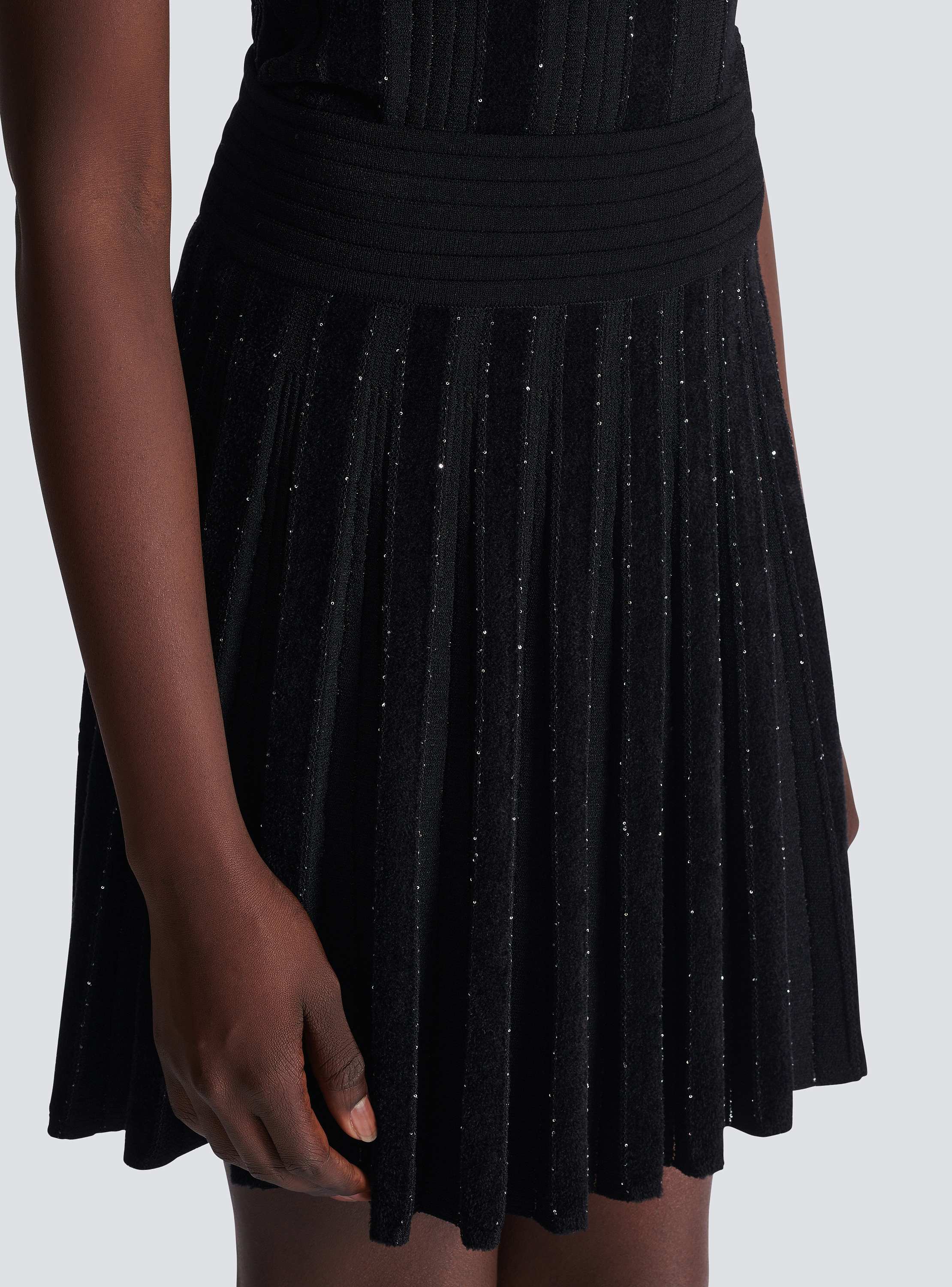 Pleated glitter knit skirt