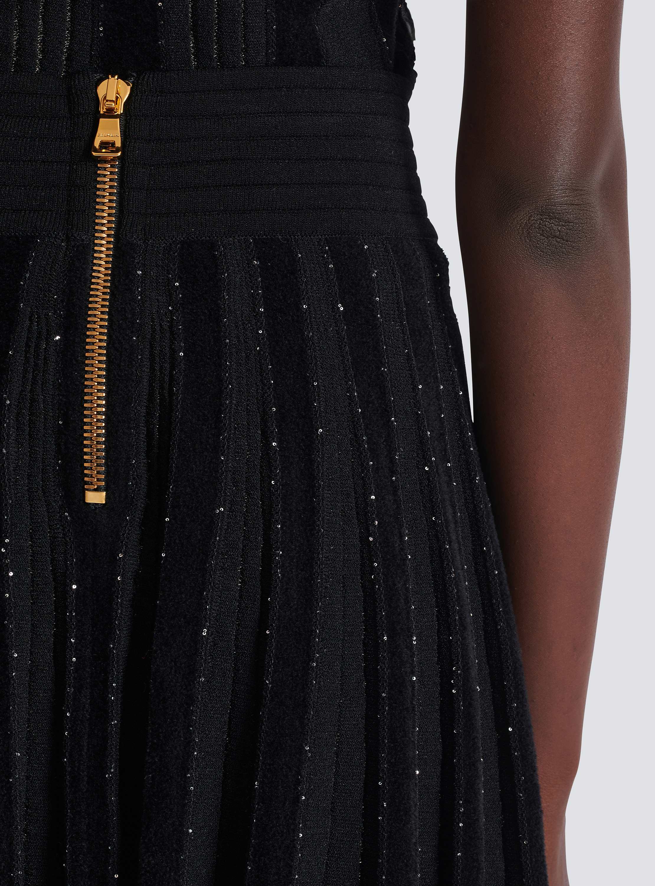 Pleated glitter knit skirt