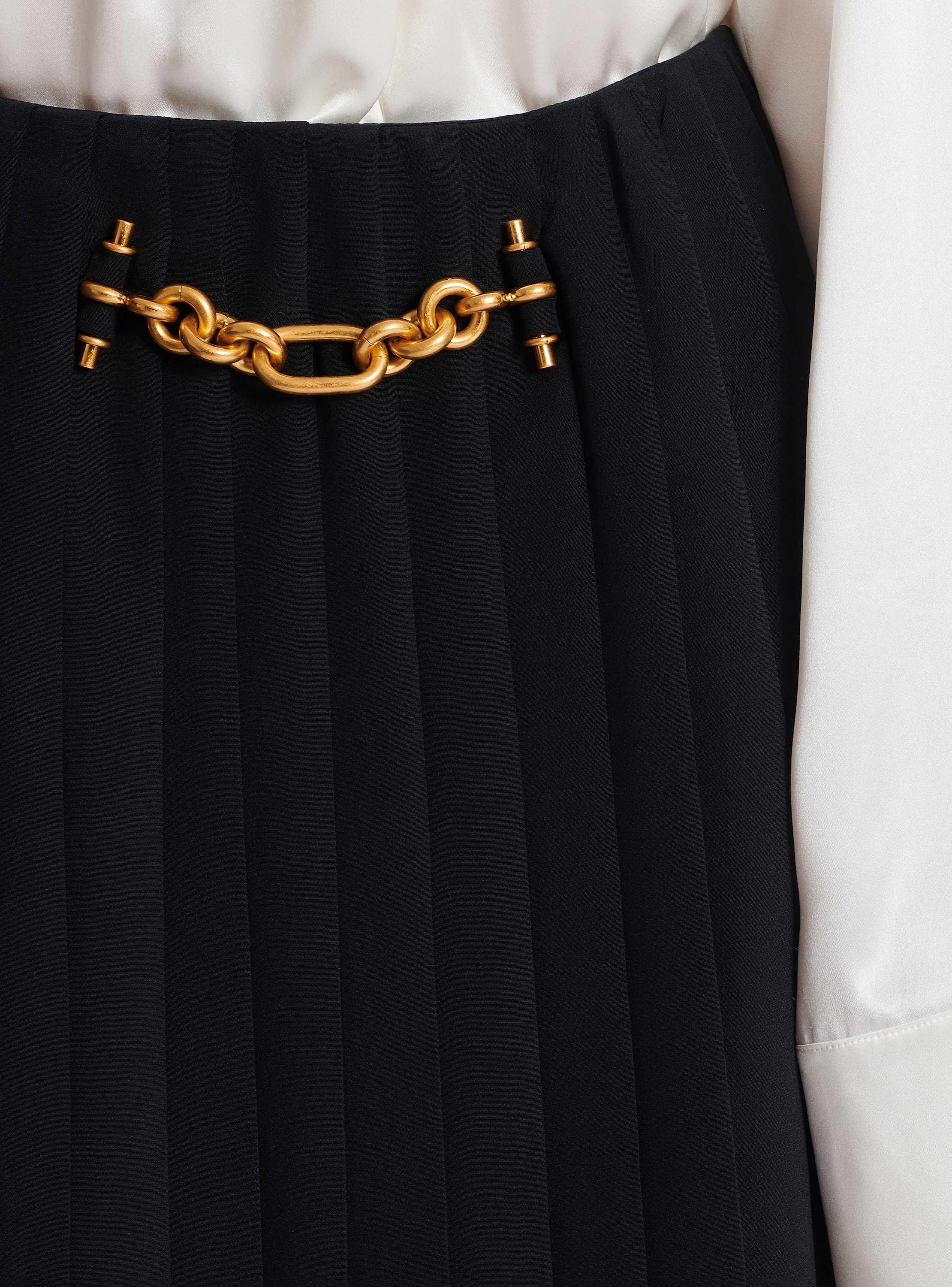 Pleated silk midi skirt with embellished detail