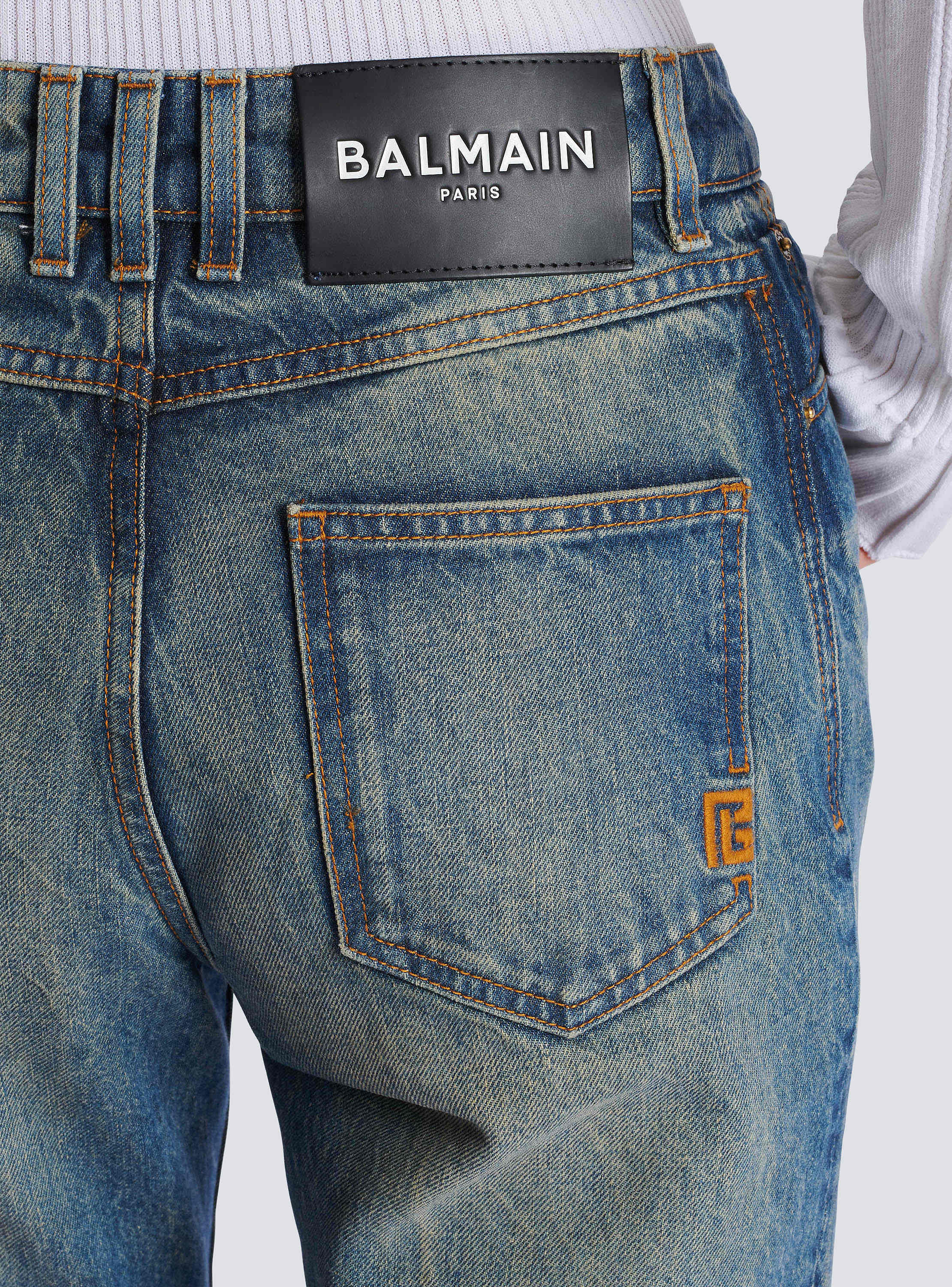 Straight-leg faded denim jeans