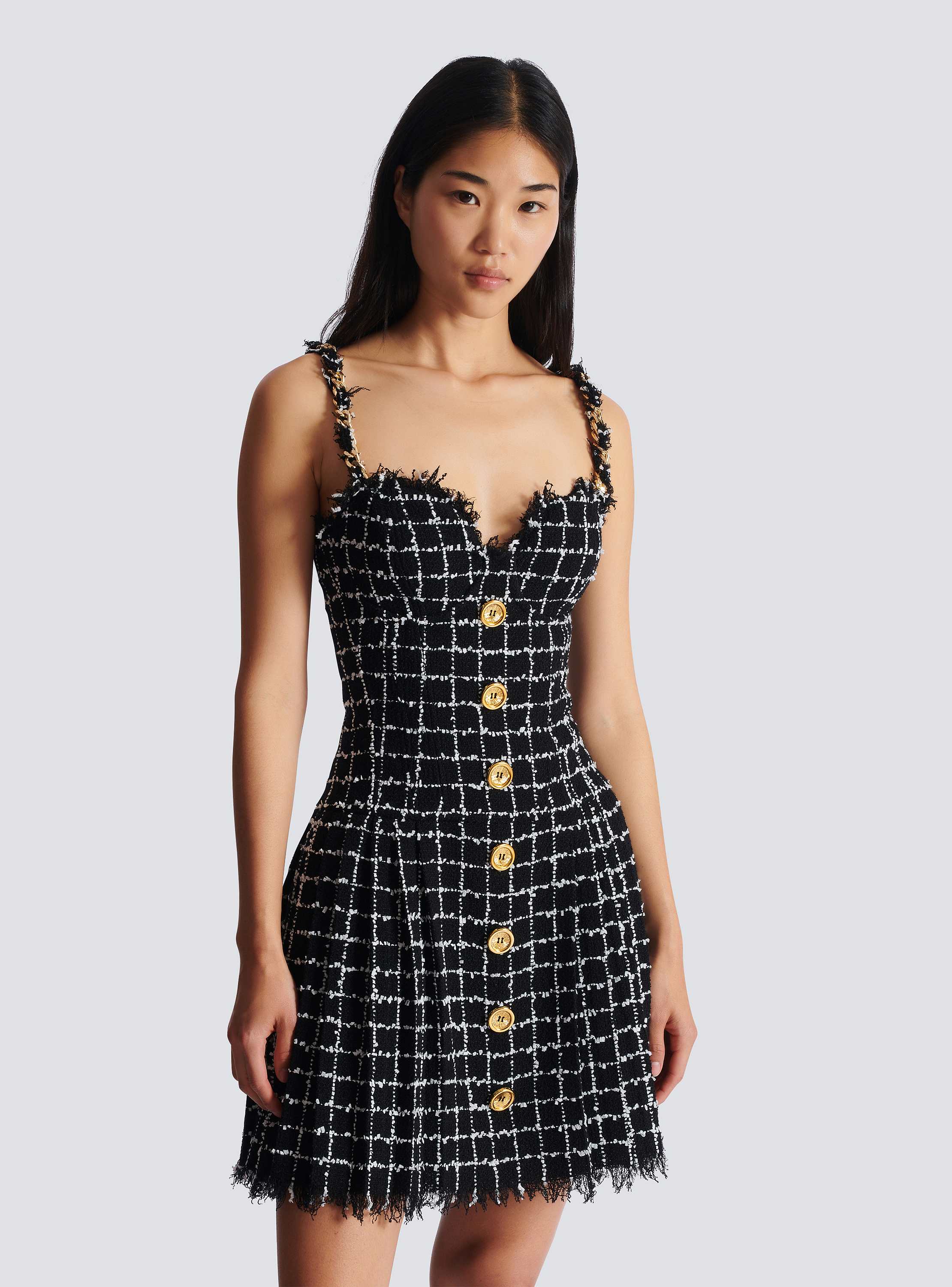 Tweed dress with chain straps