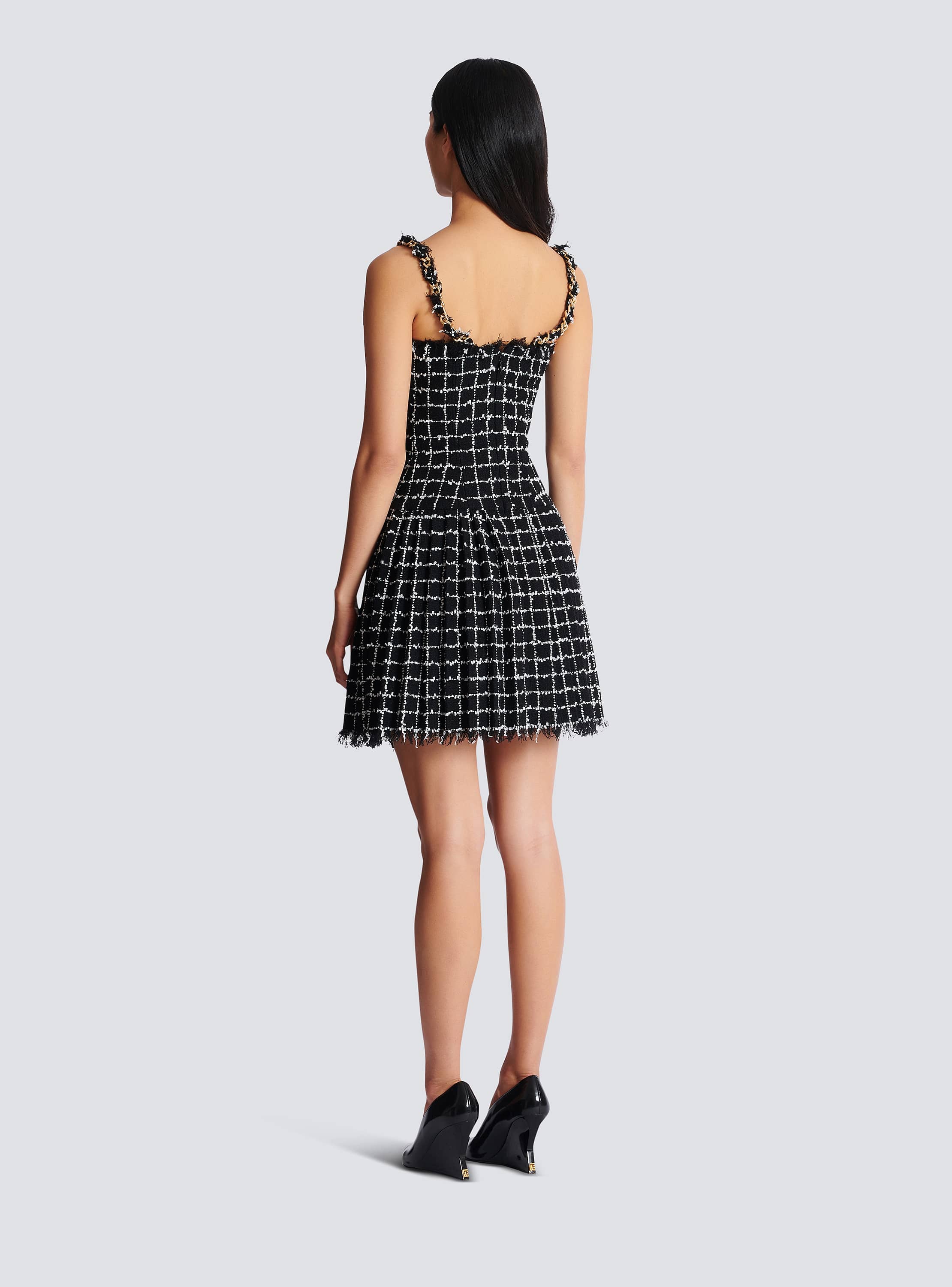 Tweed dress with chain straps