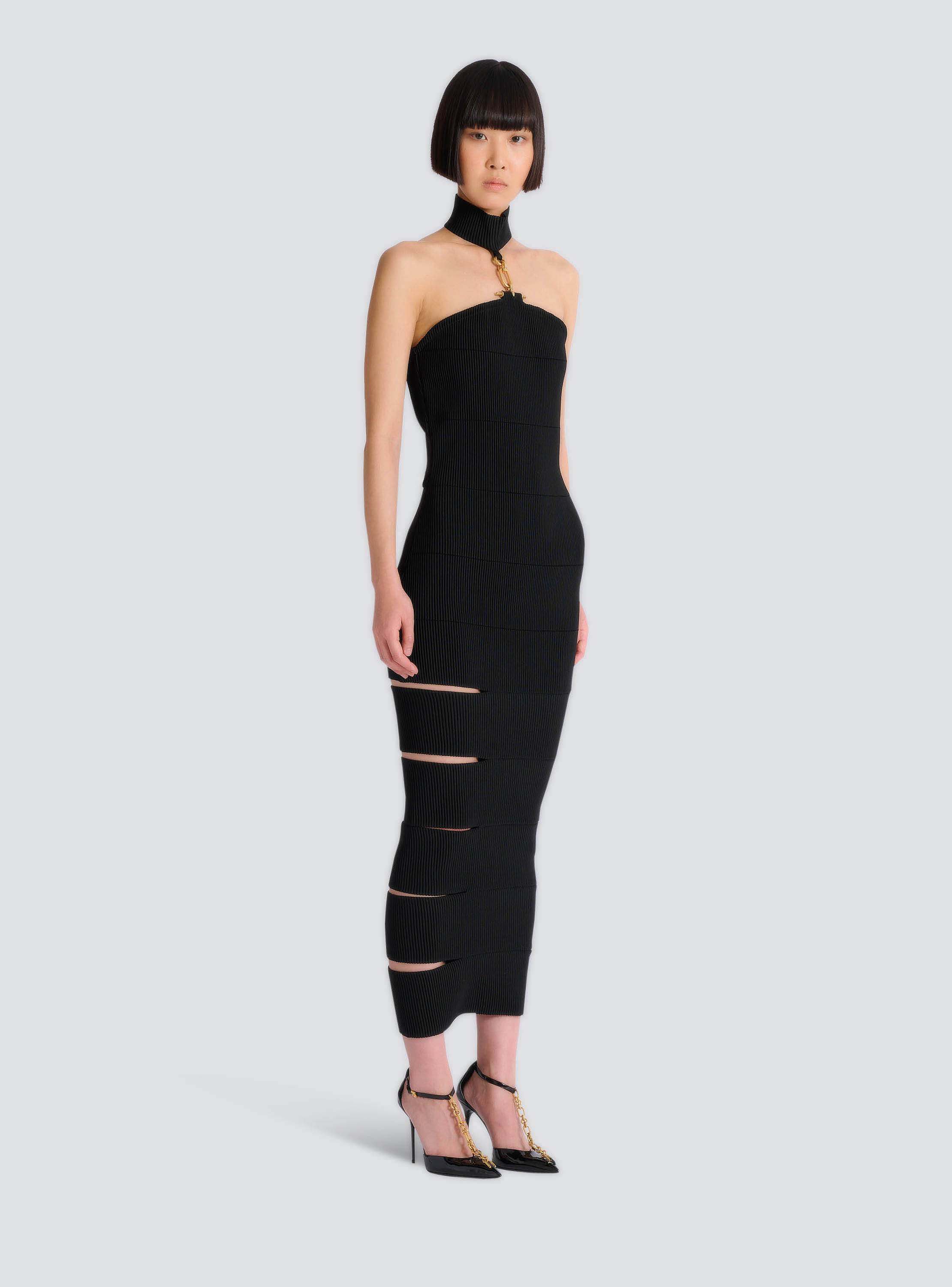 Long sleeveless dress with embellished detail