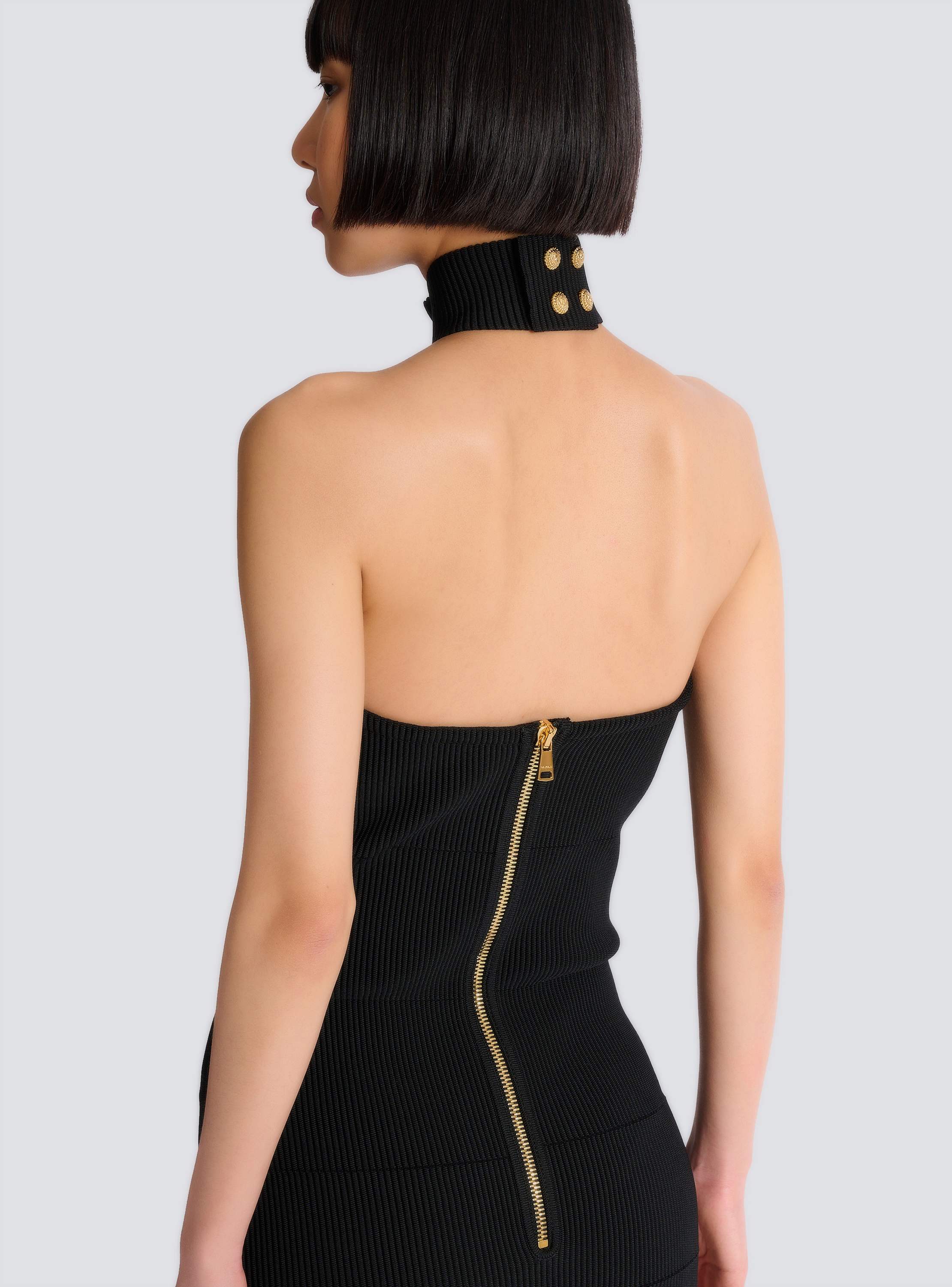 Long sleeveless dress with embellished detail