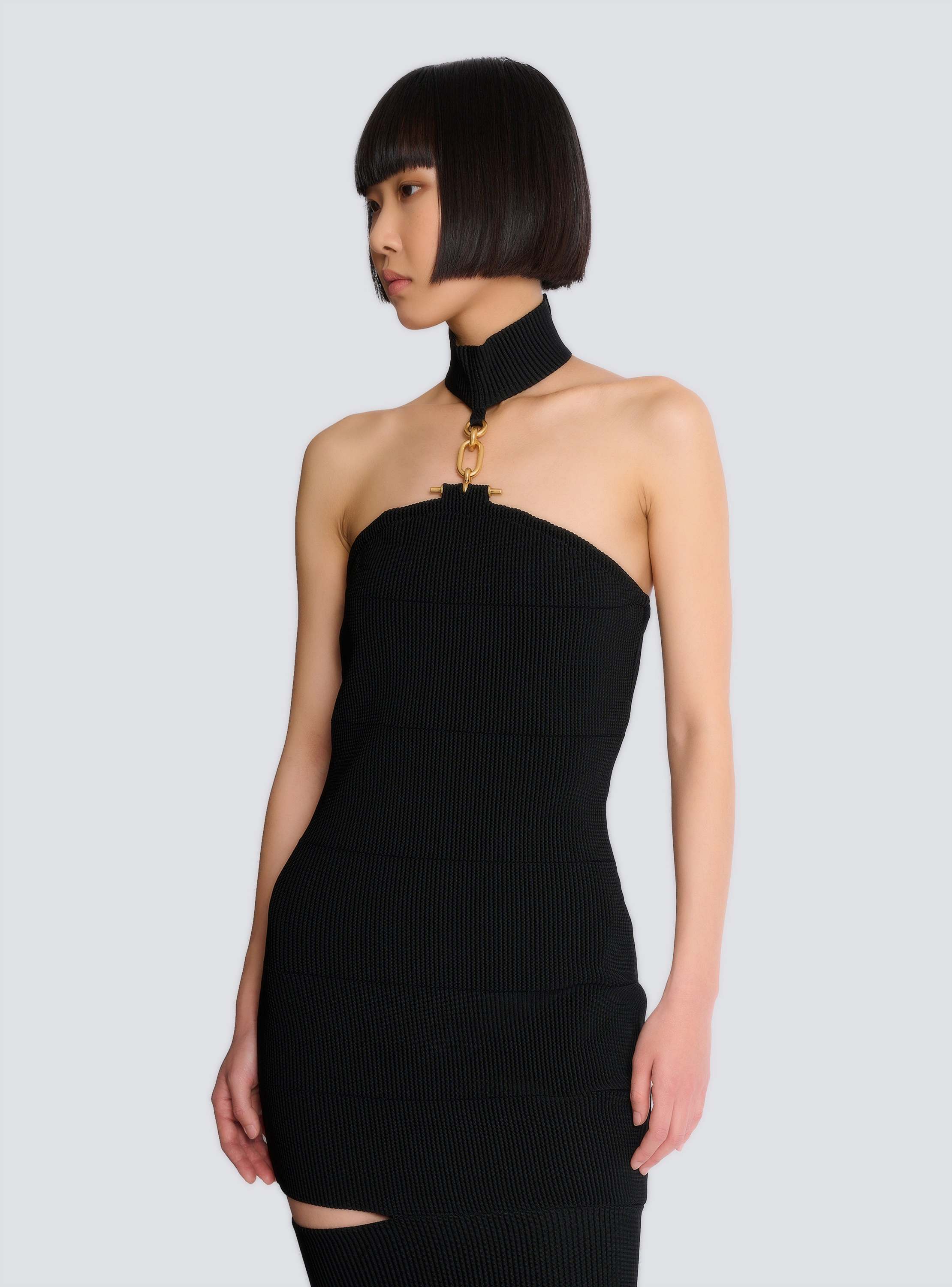 Long sleeveless dress with embellished detail