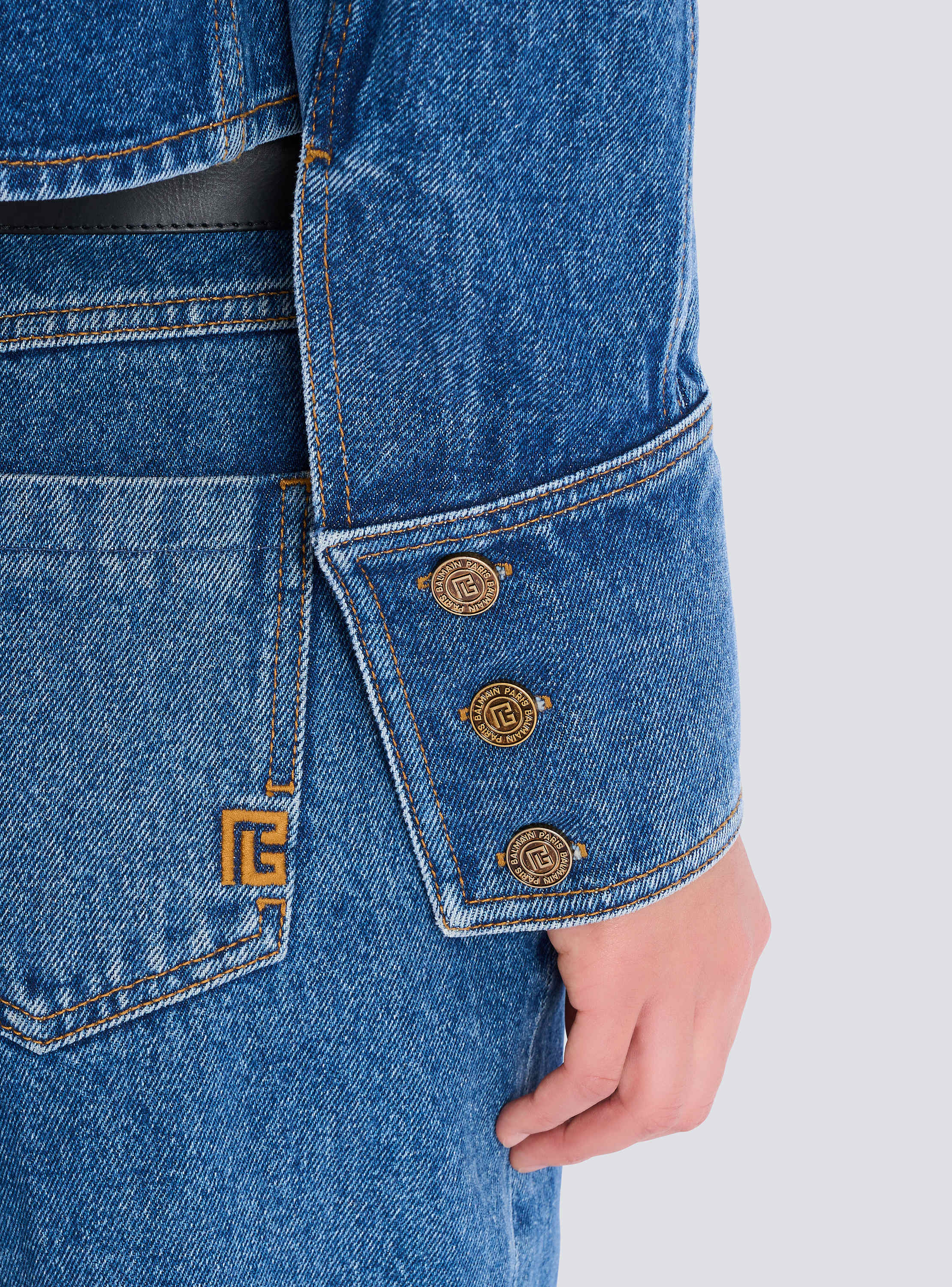 Cropped faded denim jacket