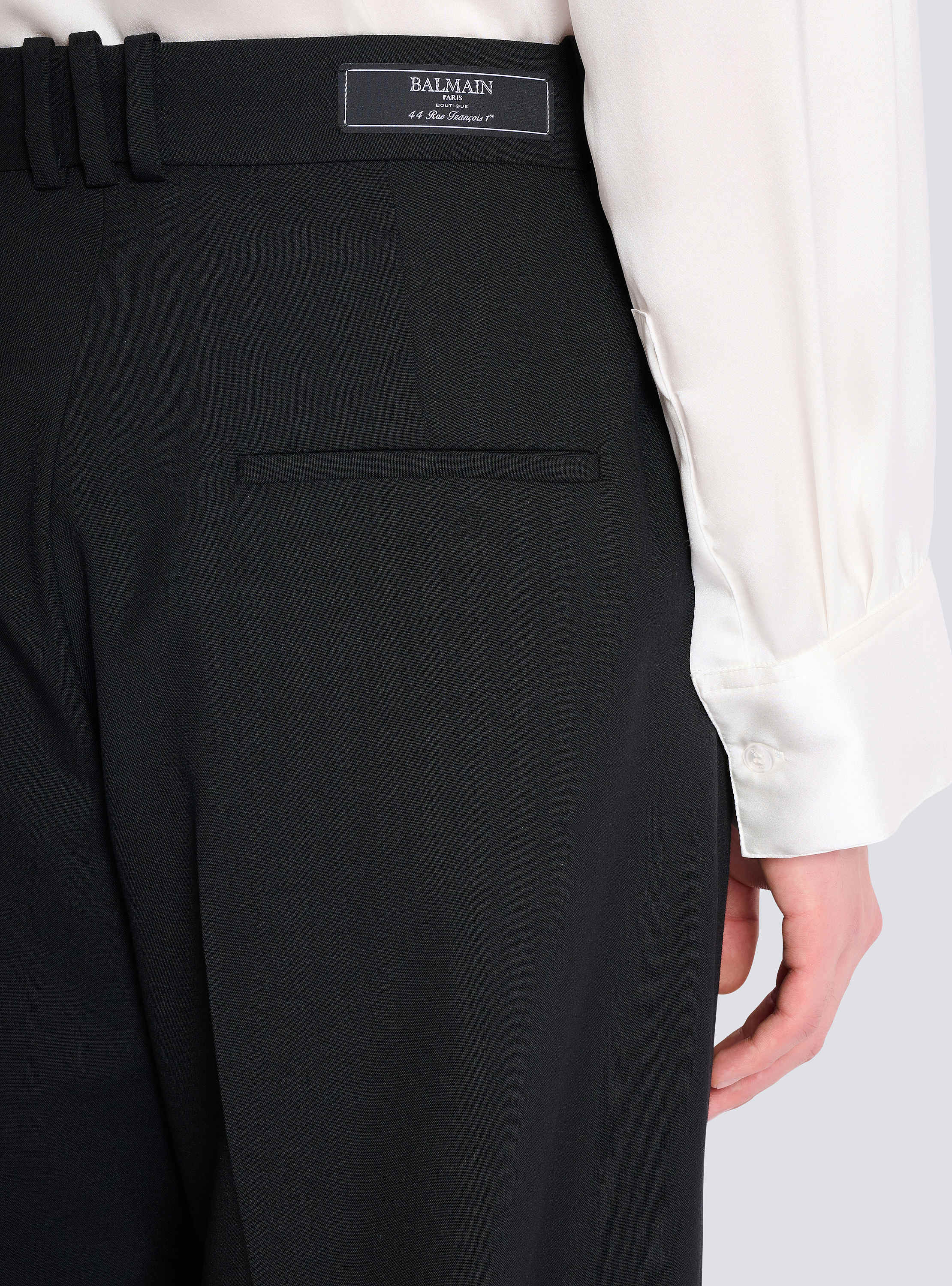 Wool twill trousers with wide knife pleats