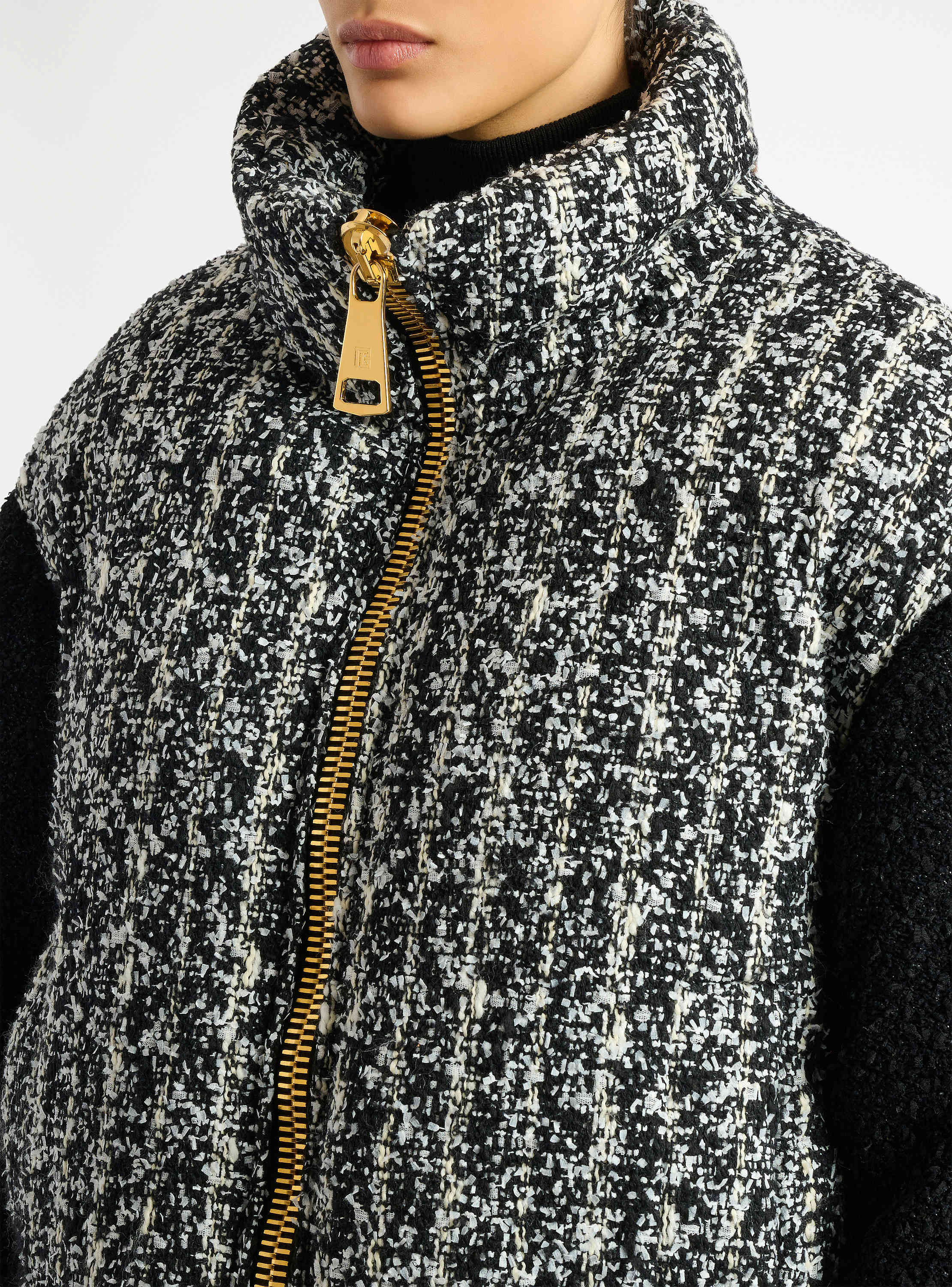 Plum&iacute;fero de tweed bicolor