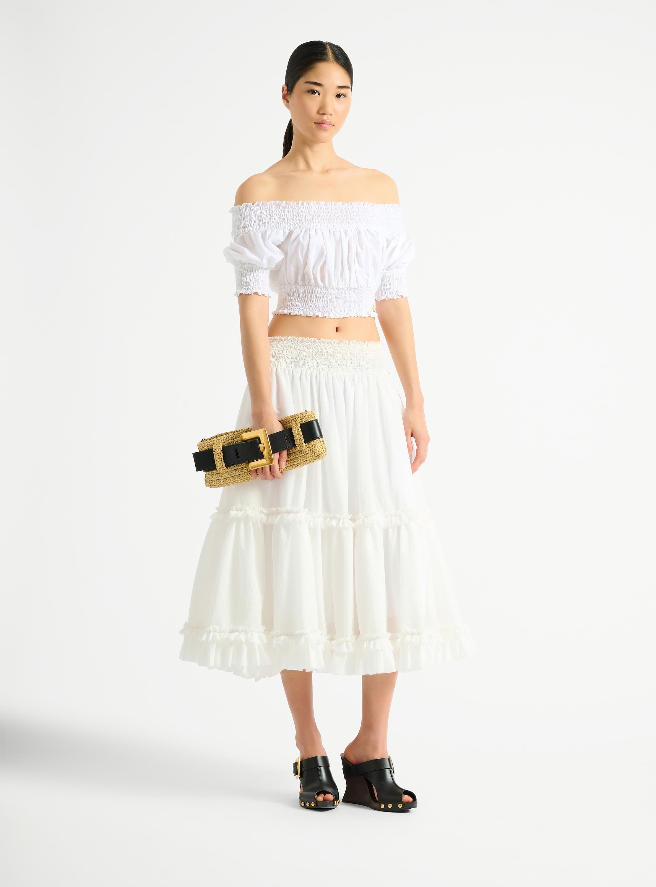 Anthem clutch bag in smooth leather and crochet