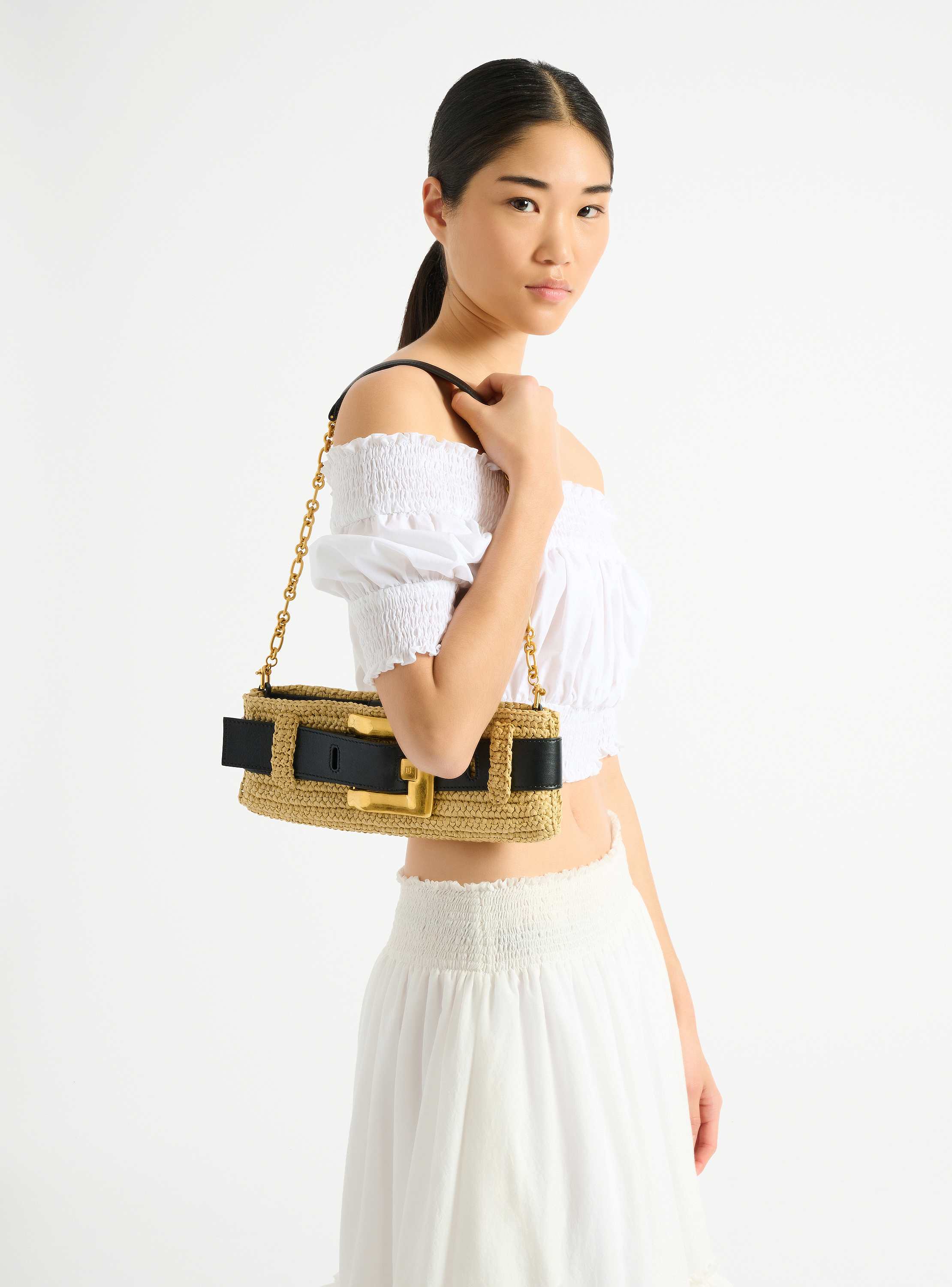 Anthem clutch bag in smooth leather and crochet