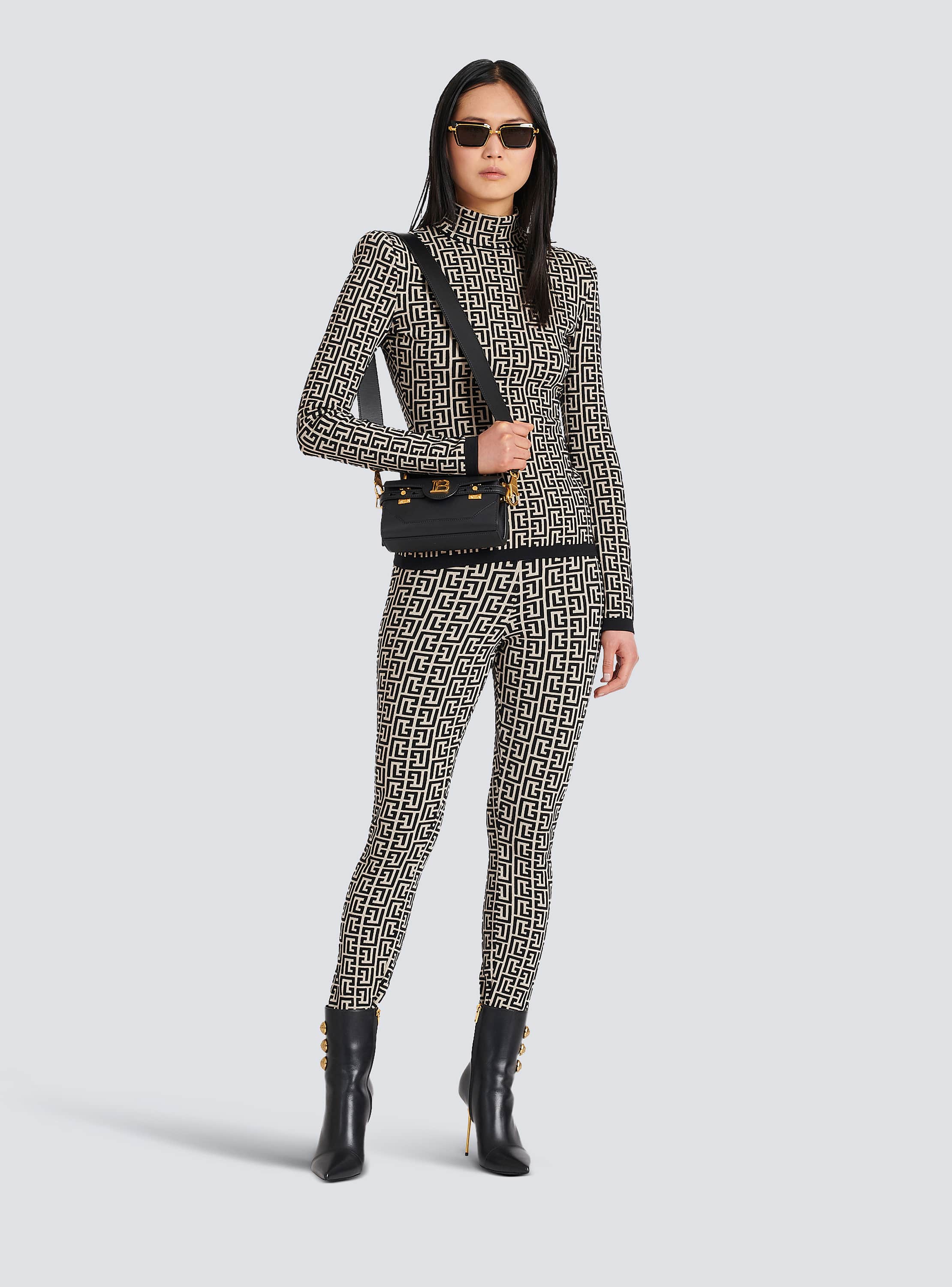 Knit leggings with monogram - Women | BALMAIN