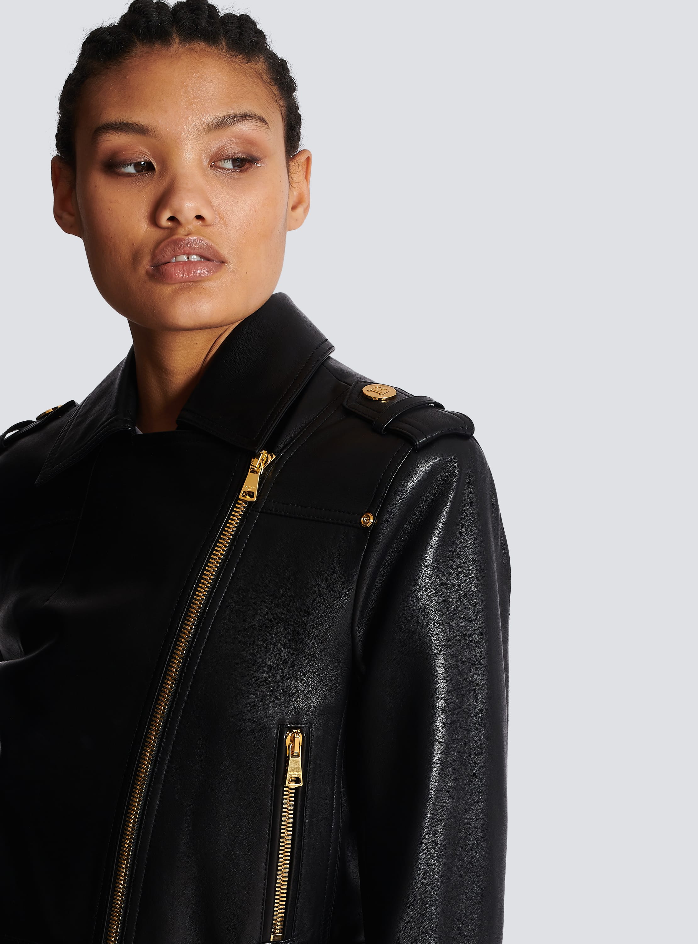 Black leather moto shop jacket with gold hardware