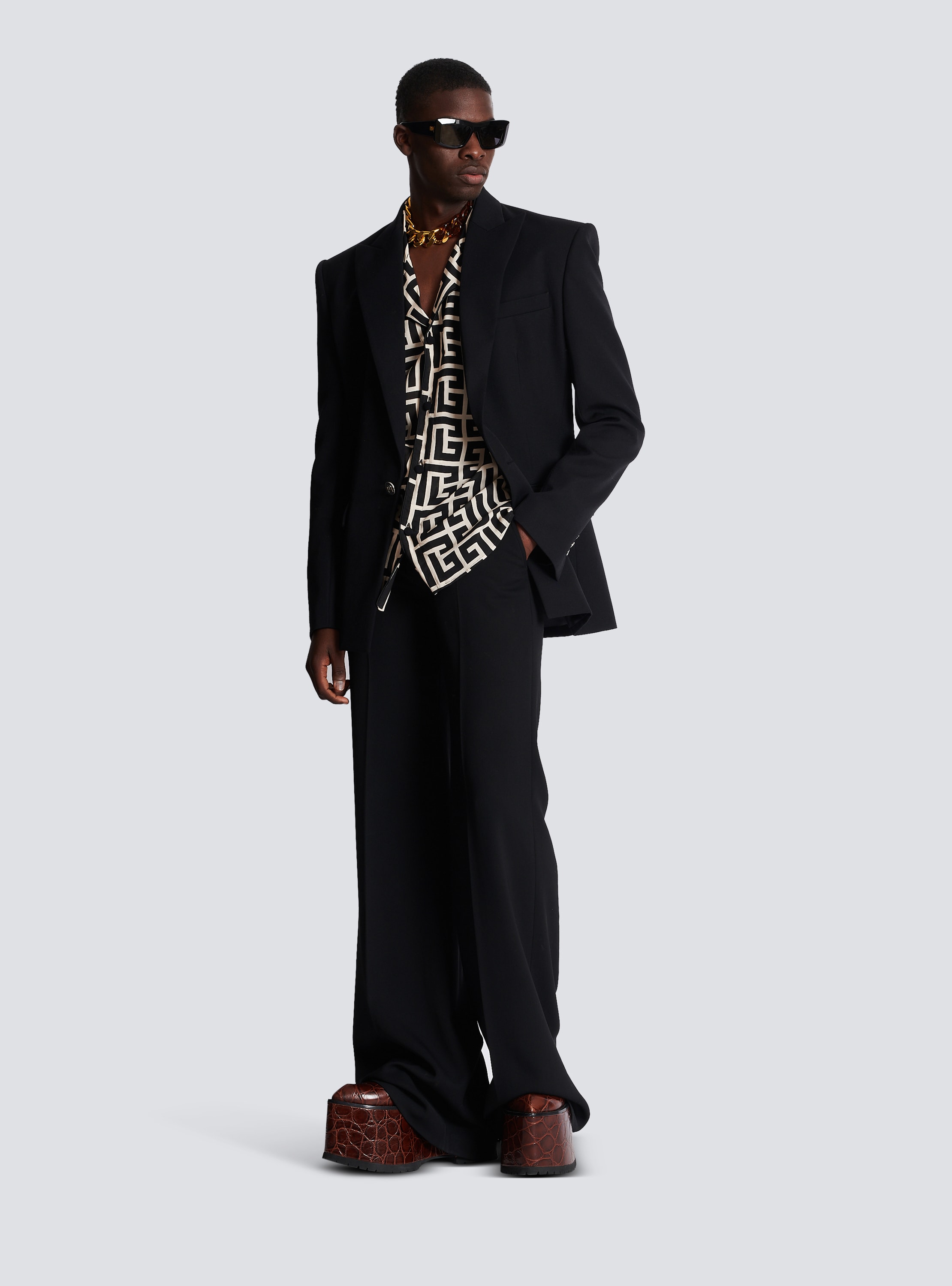 Printed shirt with store black suit