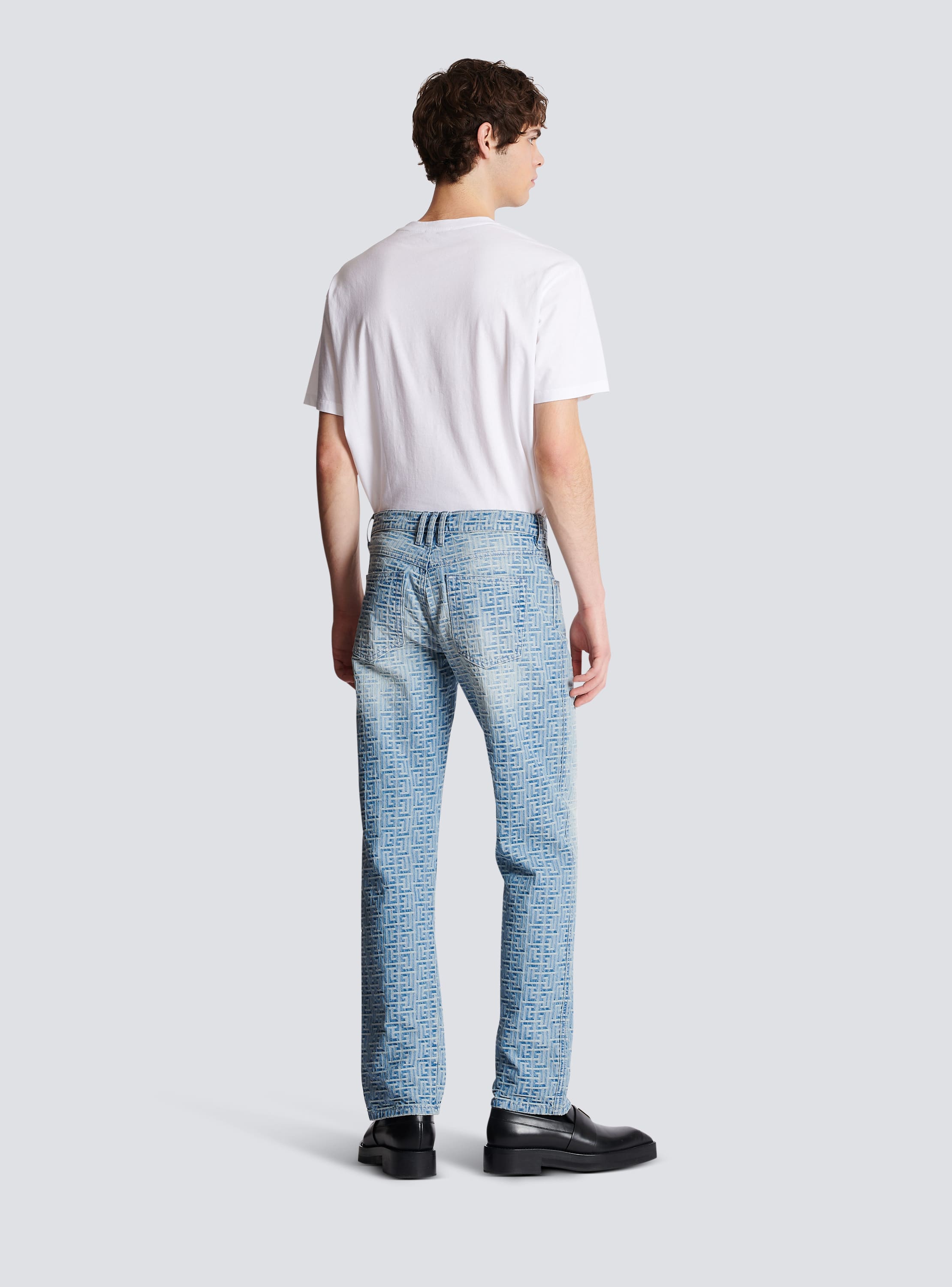 Monogrammed jacquard denim jeans