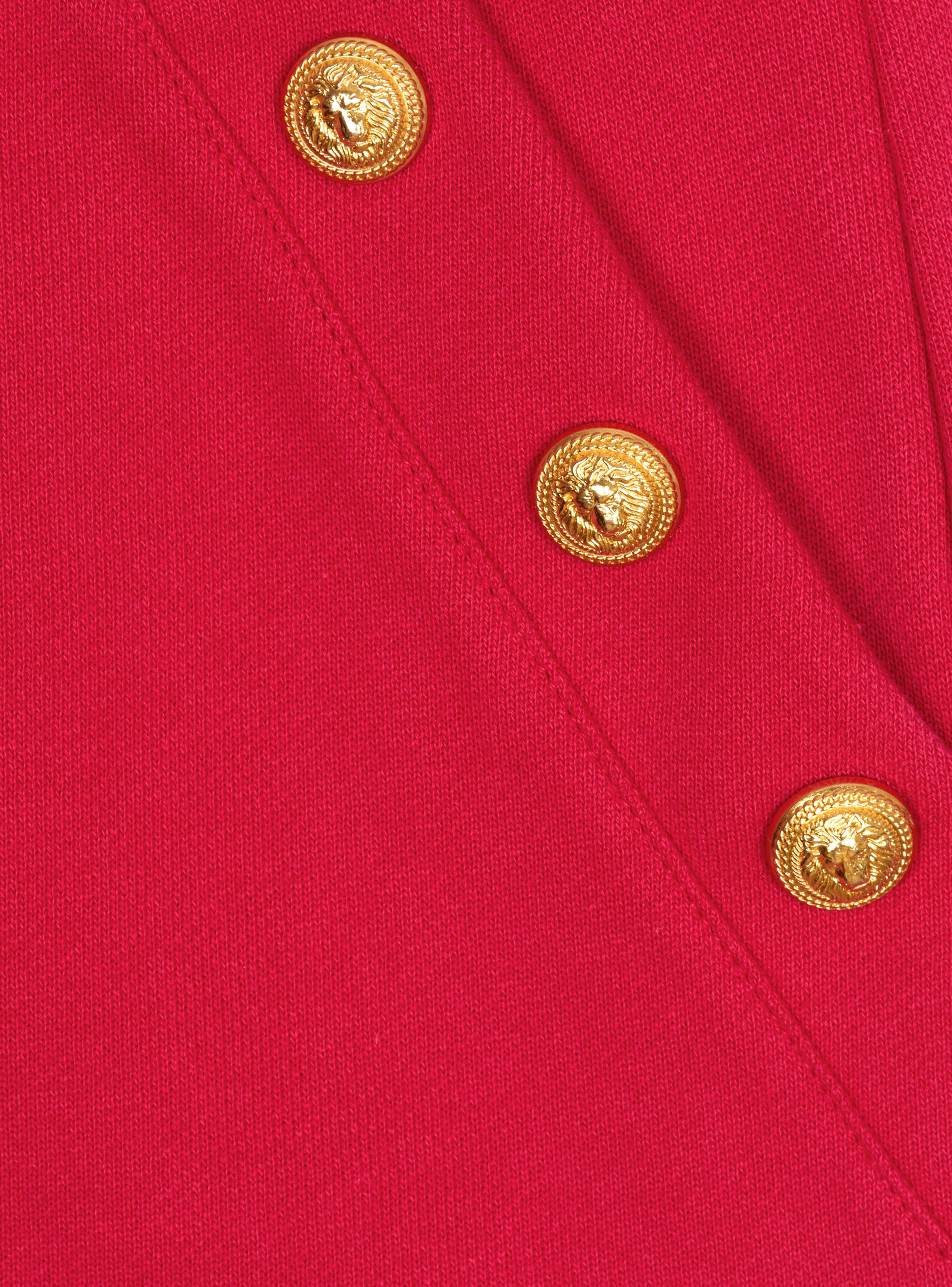 Skirt with embossed buttons