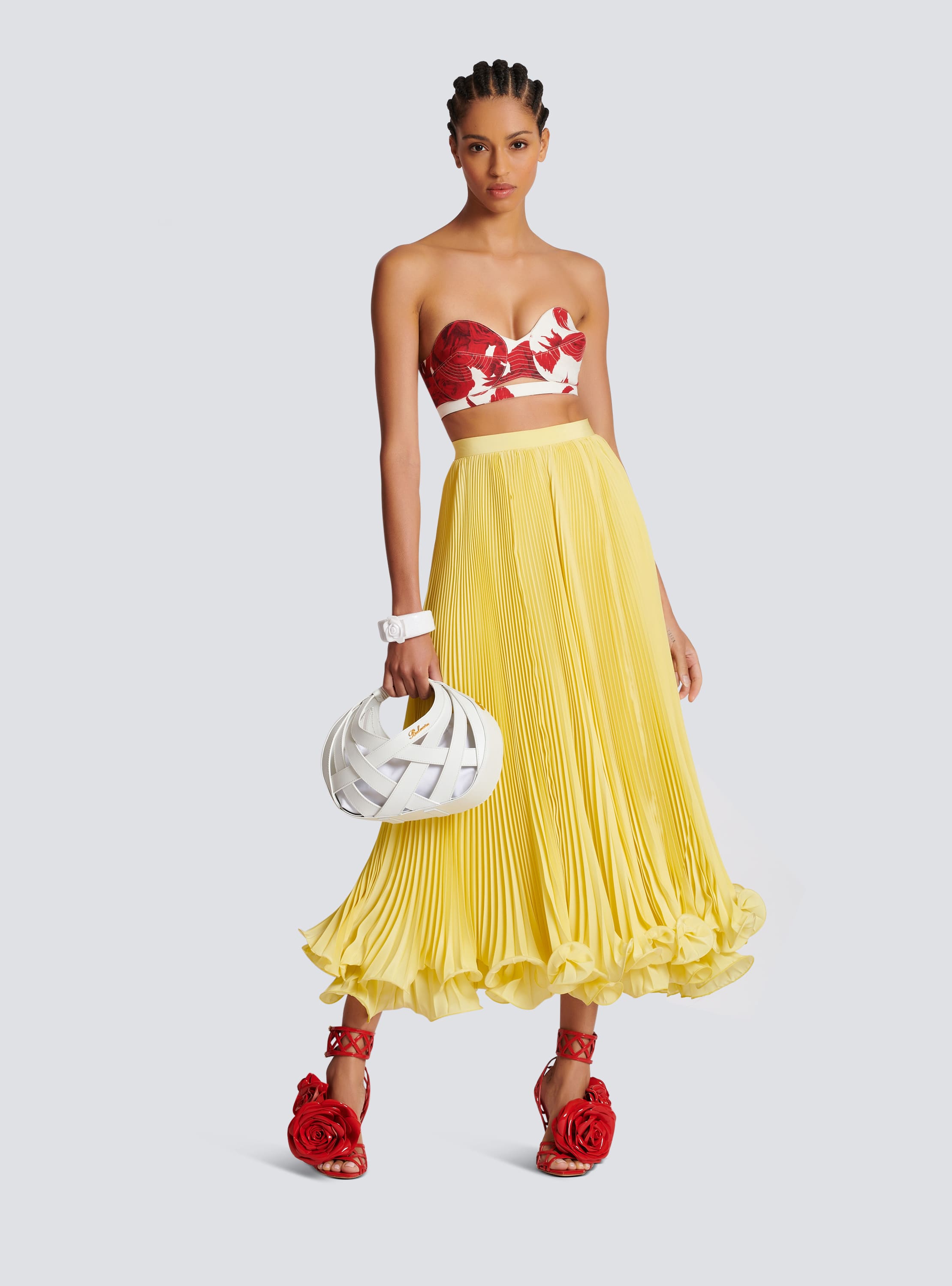 Long pleated skirt with ruffles