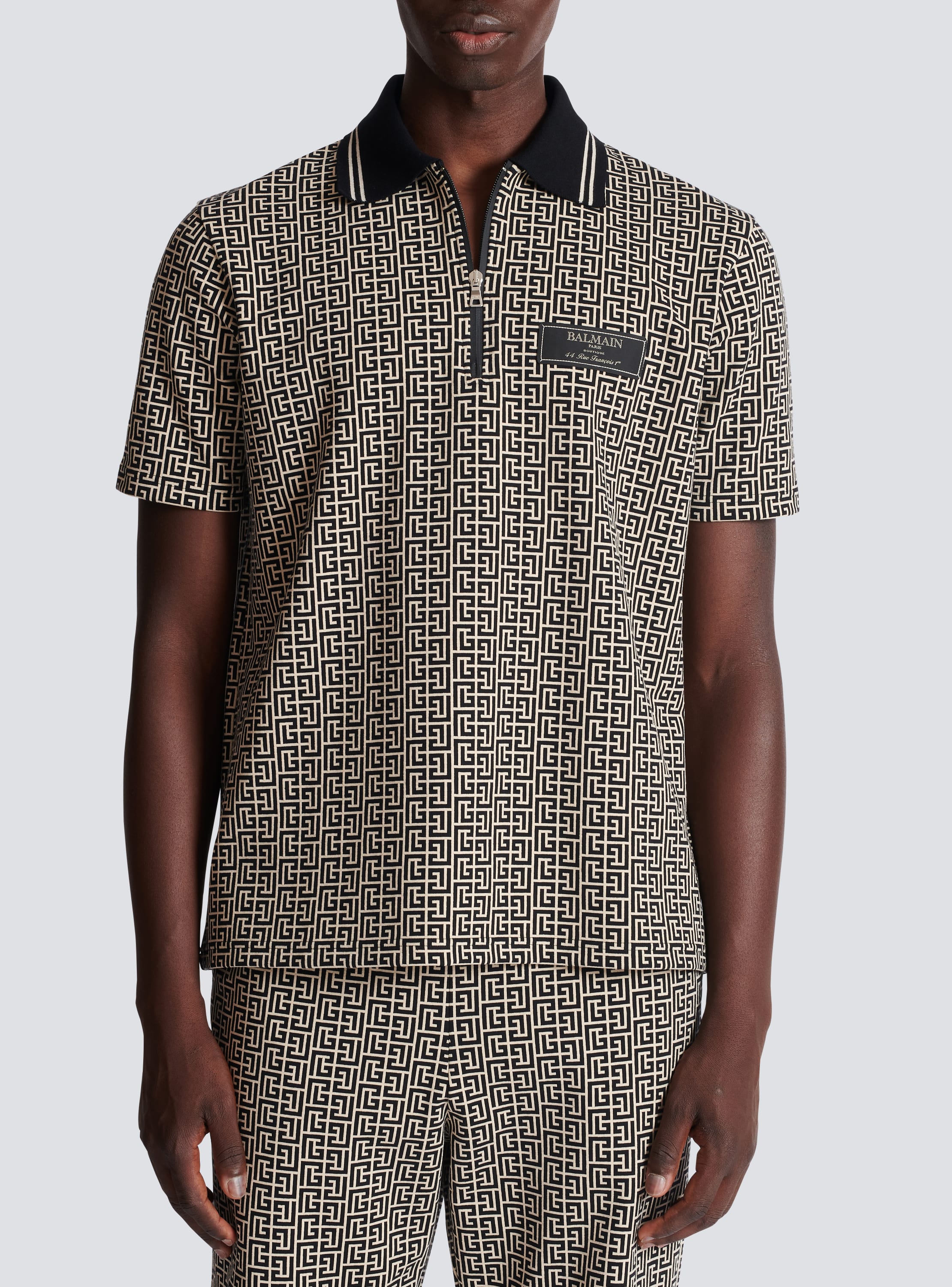 Monogram zip polo shirt - Men | BALMAIN