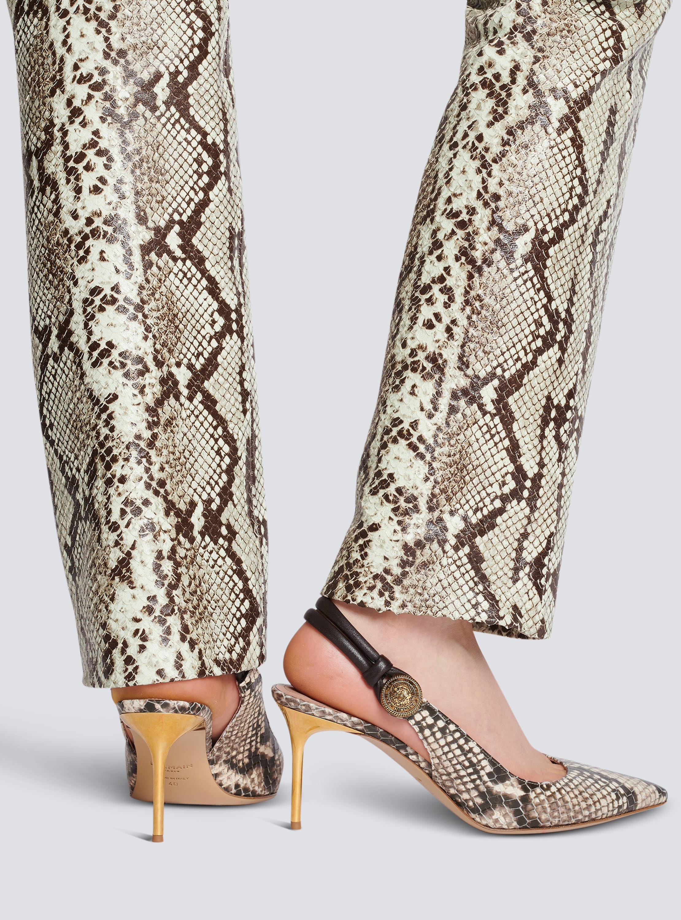 Snake-effect leather pumps