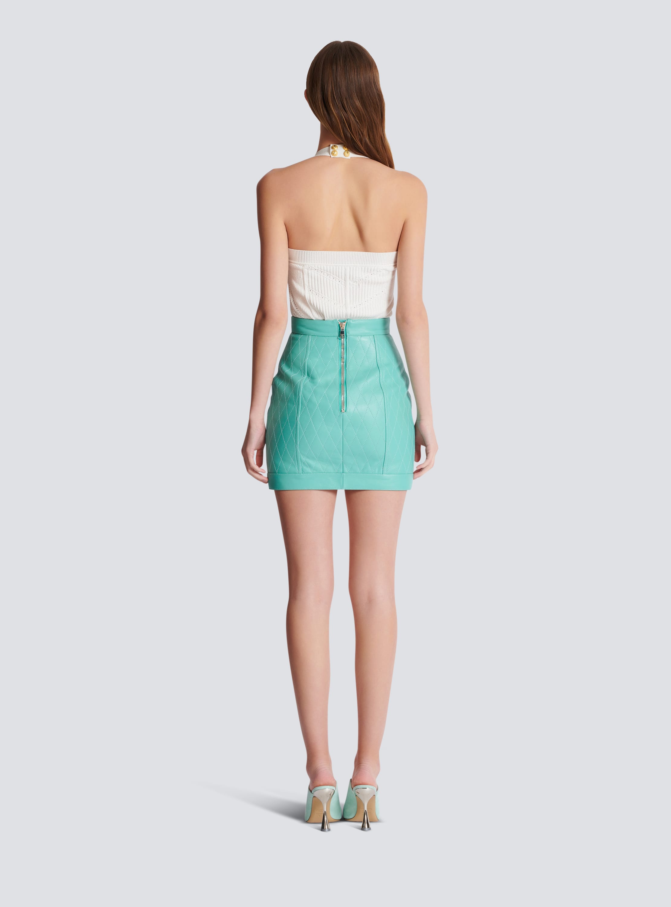 Topstitched leather skirt with buttons
