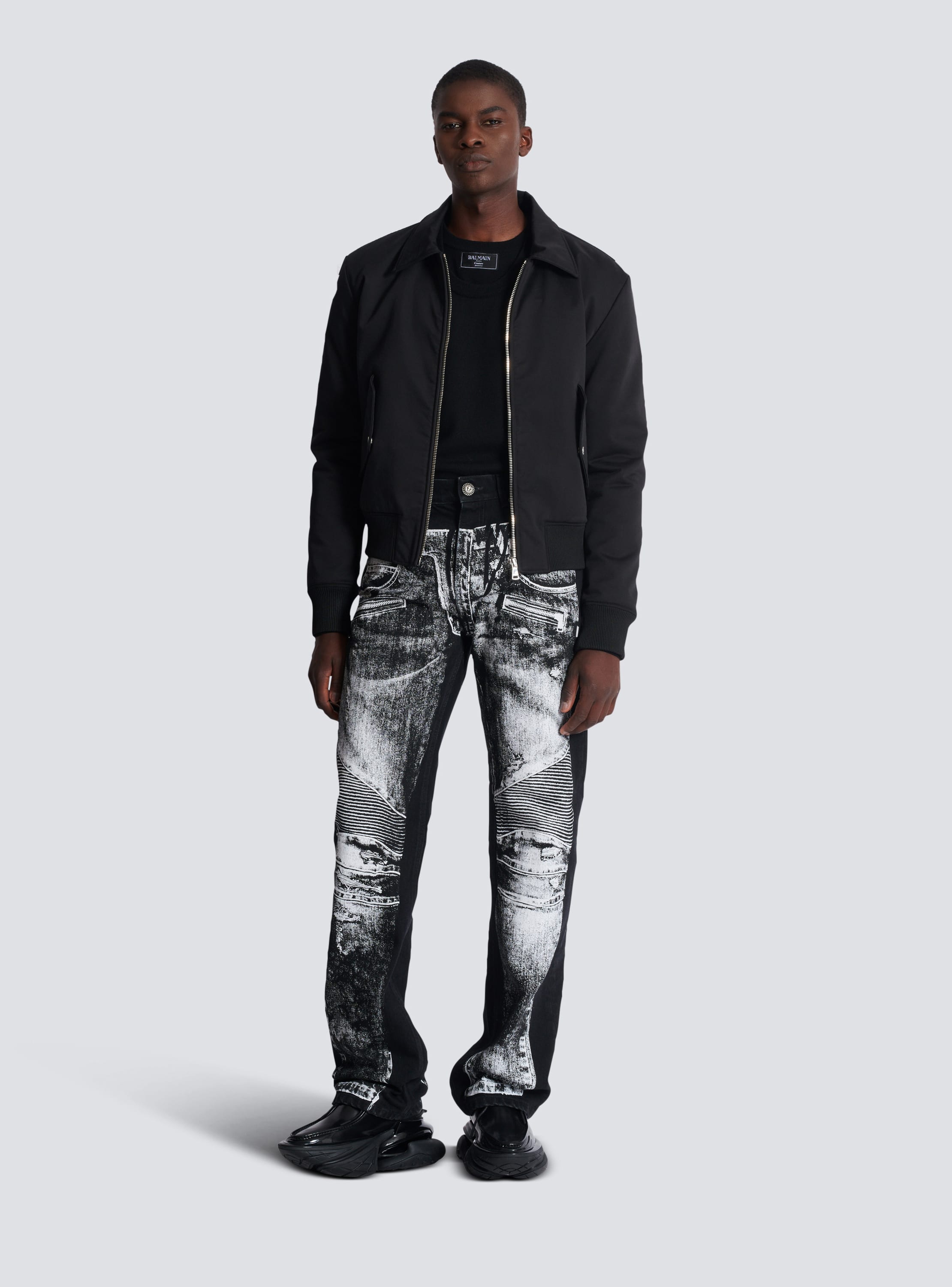 Loose-fit denim jeans with a biker print