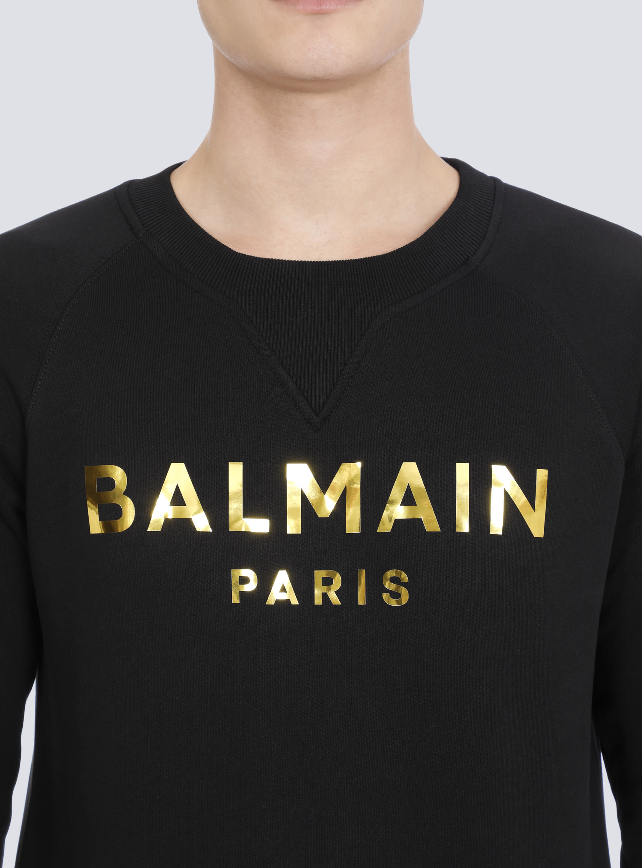 コットン スウェットシャツ メタリックBalmain Parisロゴプリント