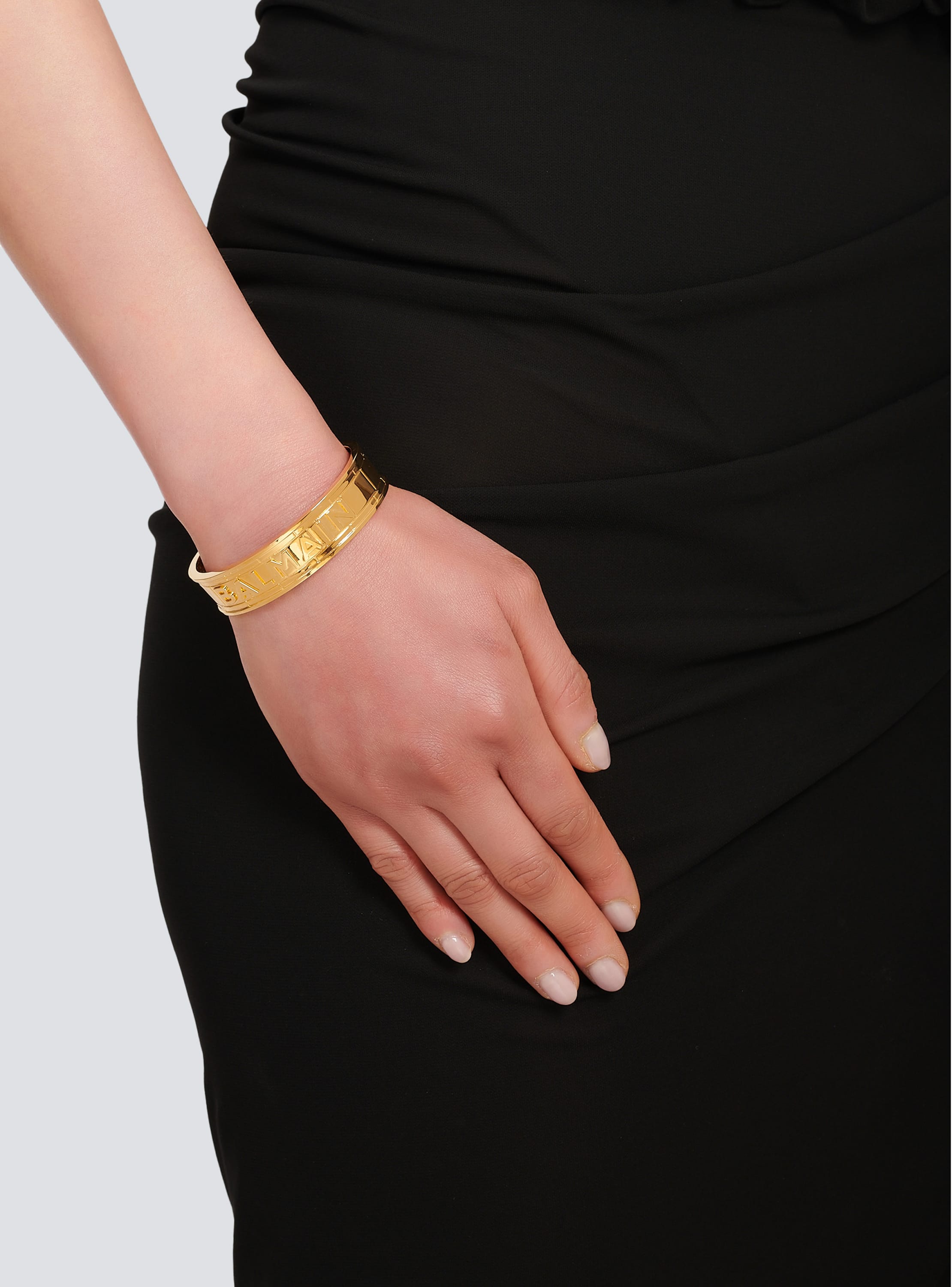 Gold-tone brass cuff bracelet with Balmain logo